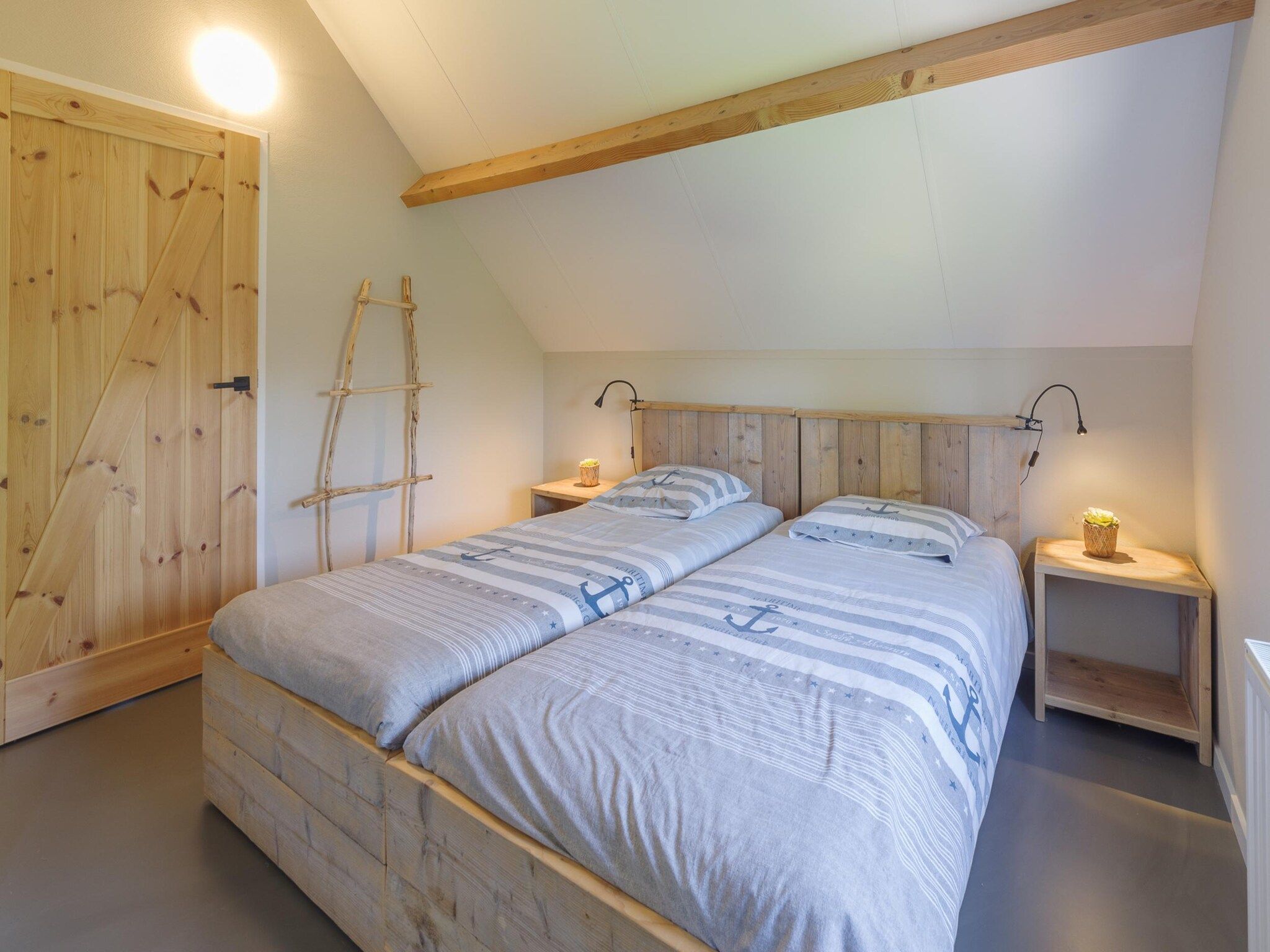 Een slaapkamer van Villapark De Oesterbaai 74 in Wemeldinge