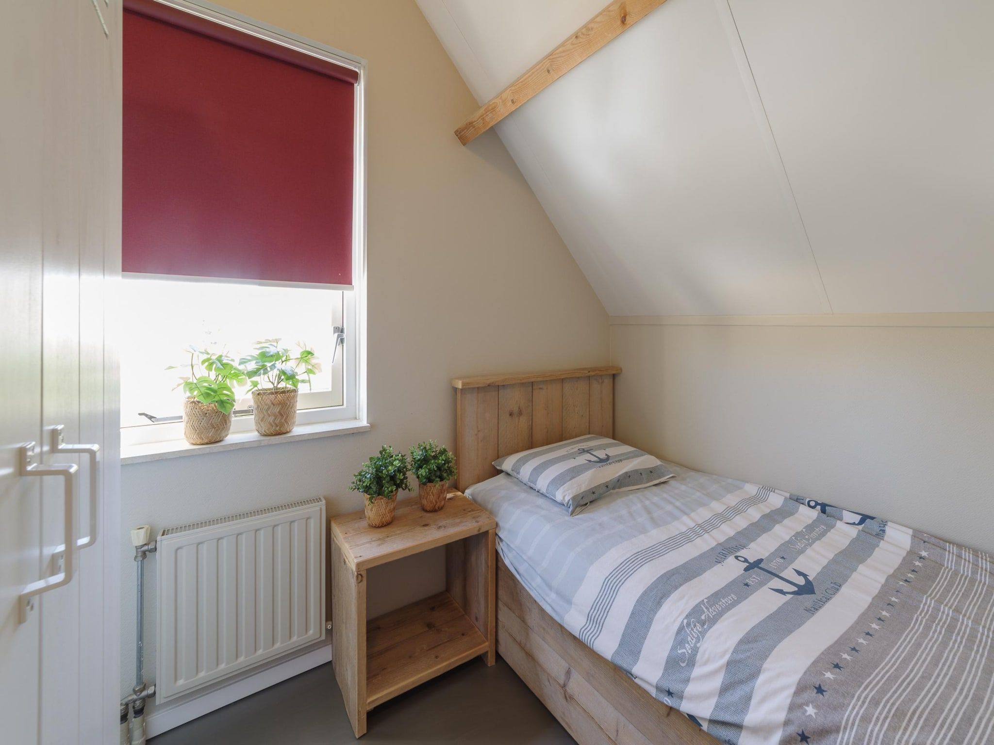 Een slaapkamer van Villapark De Oesterbaai 74 in Wemeldinge