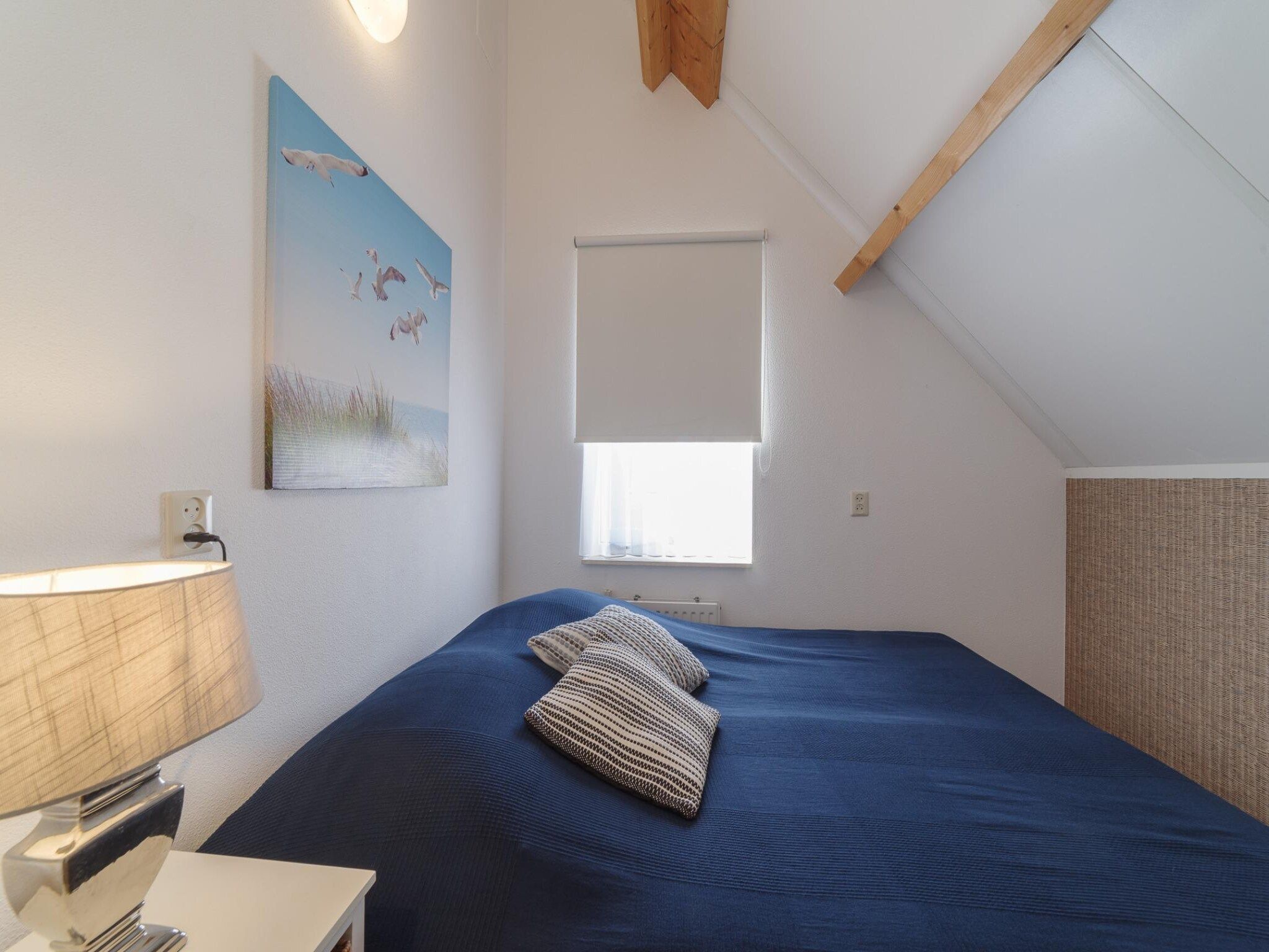 Een slaapkamer van Villapark De Oesterbaai 5 in Wemeldinge