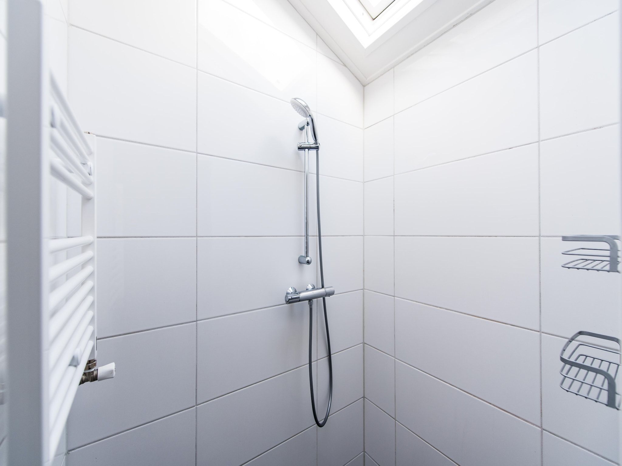 De badkamer van Vakantiepark Boomhiemke 17 in Hollum