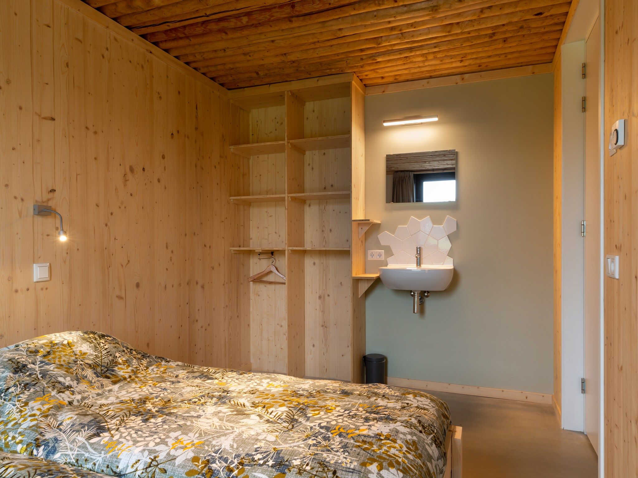 Een slaapkamer van Koe in de Kost 4 in Heeten