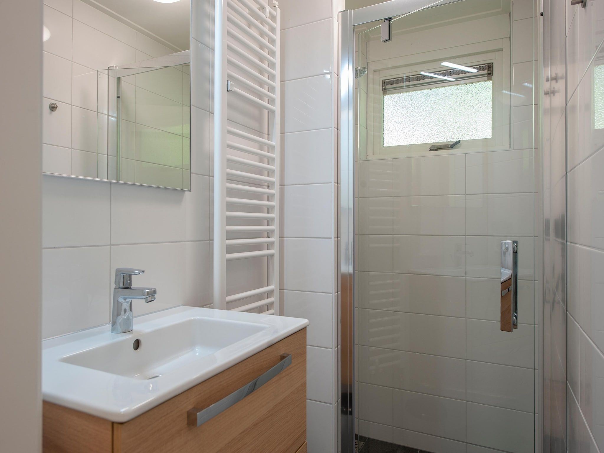 De badkamer van Bospark de Schaapskooi 10 in Wissel/Epe