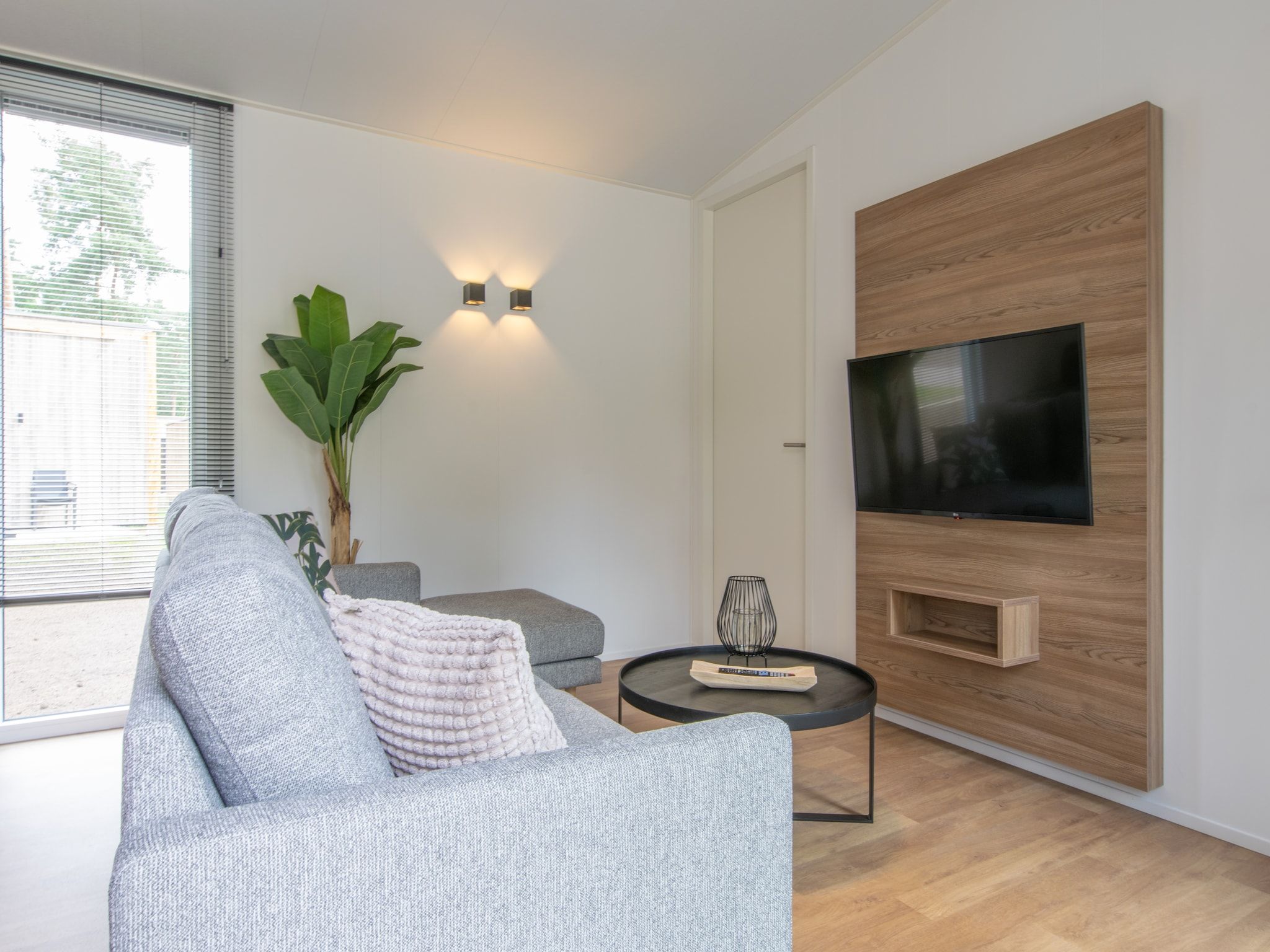 De woonkamer van Bospark 't Wolfsven 19 in Mierlo