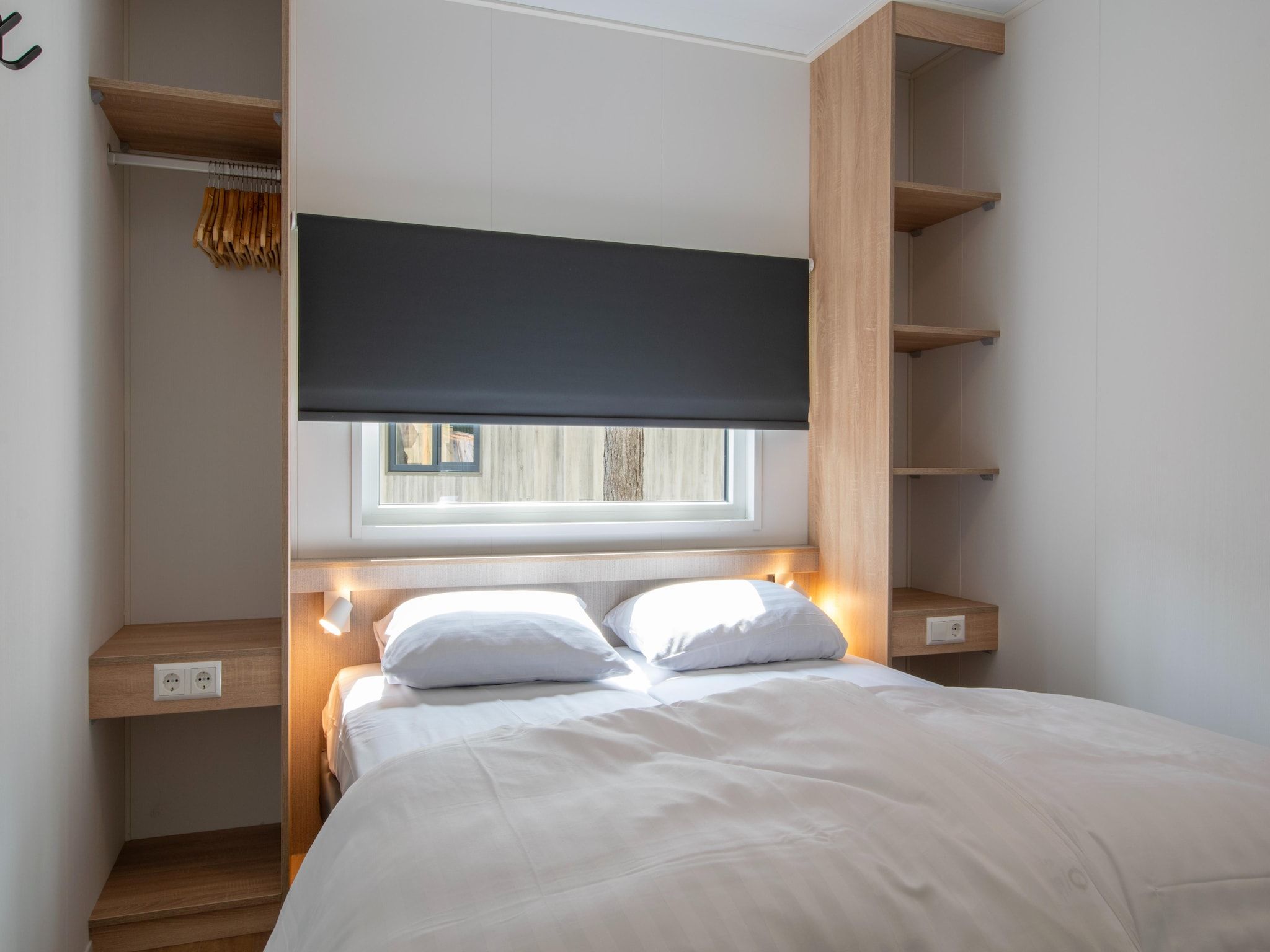 Een slaapkamer van Bospark 't Wolfsven 19 in Mierlo