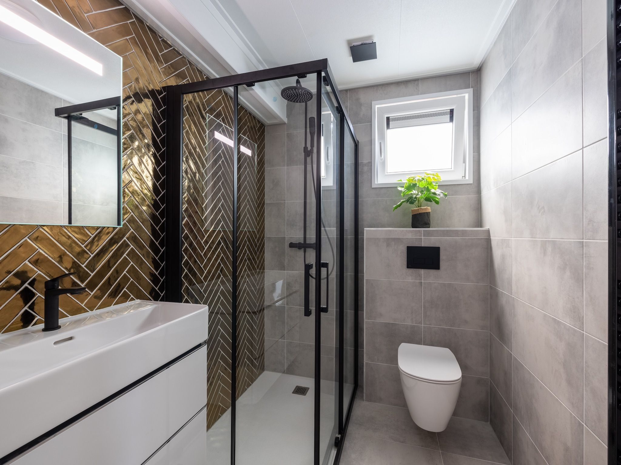 De badkamer van Vakantiepark De Rimboe & De Woeste Hoogte 40 in Hoenderloo