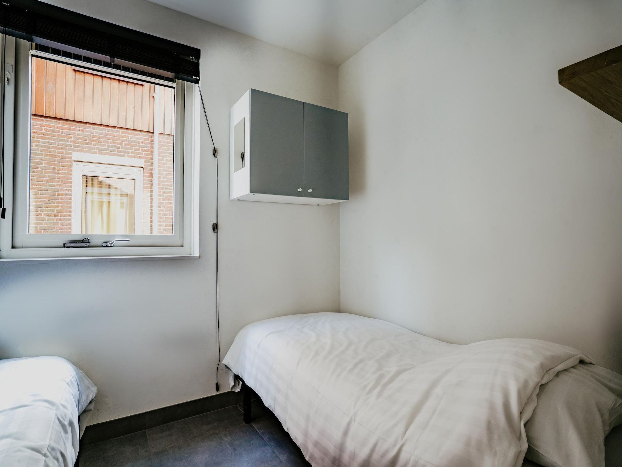 Een slaapkamer van Waterpark de Meerparel 13 in Uitgeest