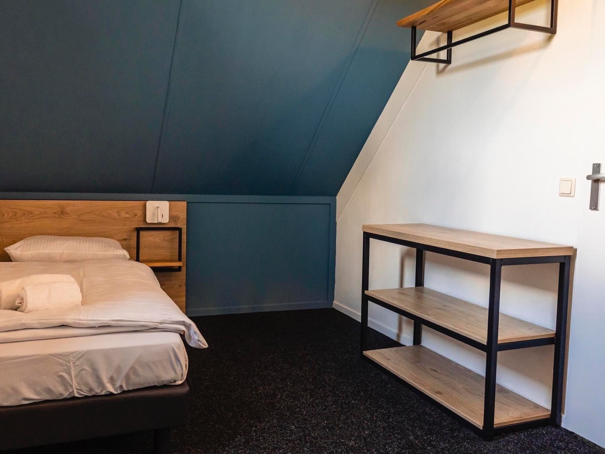 Een slaapkamer van Vakantiepark 't Broeckhuys 3 in Ewijk