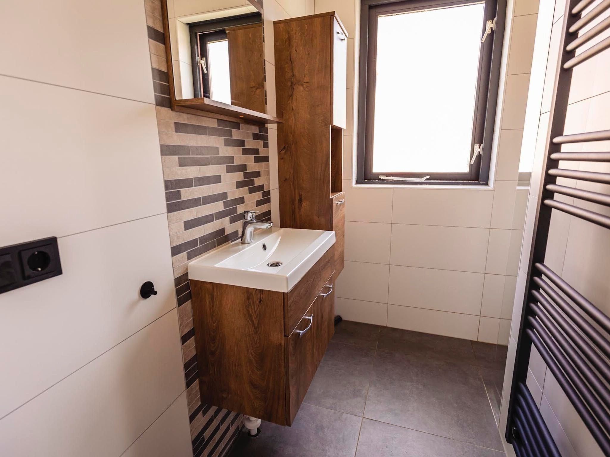 De badkamer van Vakantiepark 't Broeckhuys 3 in Ewijk