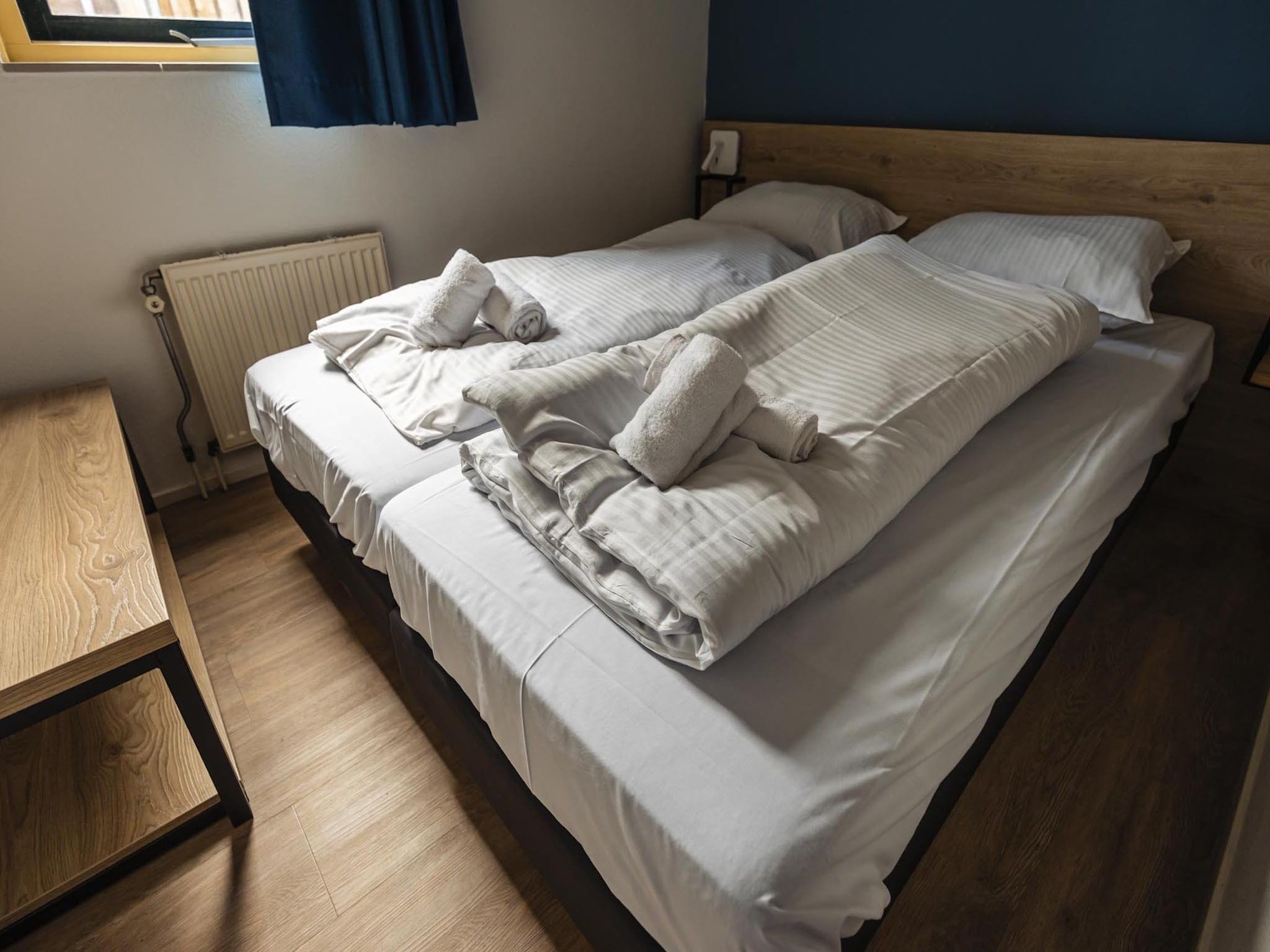 Een slaapkamer van Vakantiepark 't Broeckhuys 6 in Ewijk