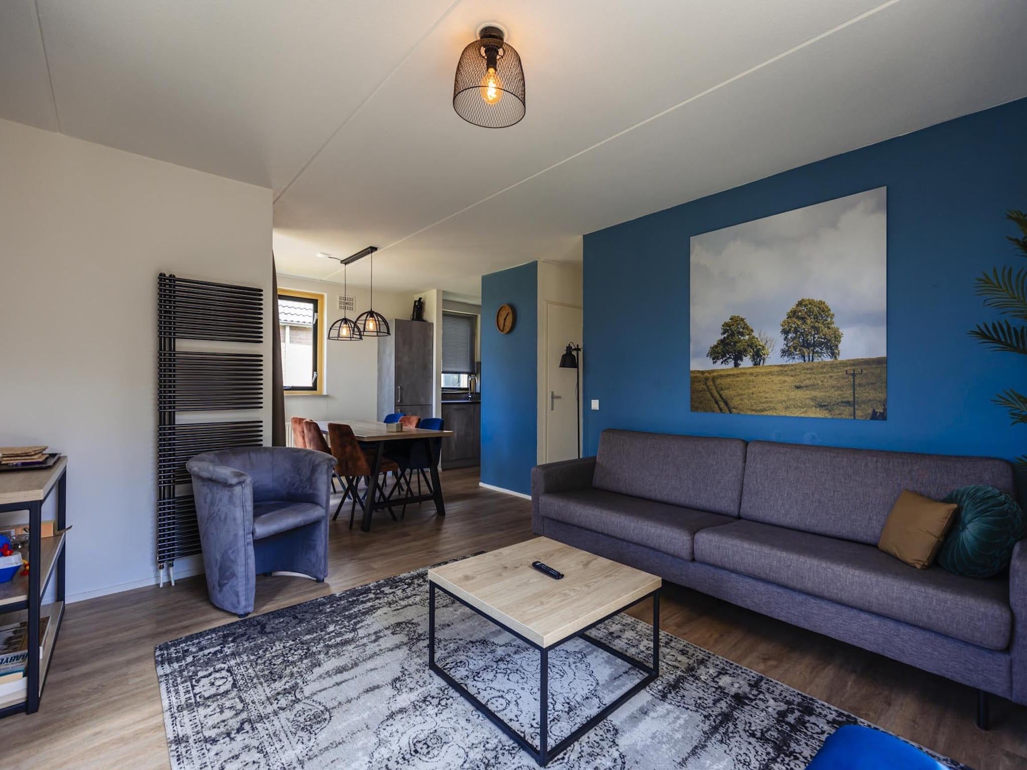 De woonkamer van Vakantiepark 't Broeckhuys 6 in Ewijk