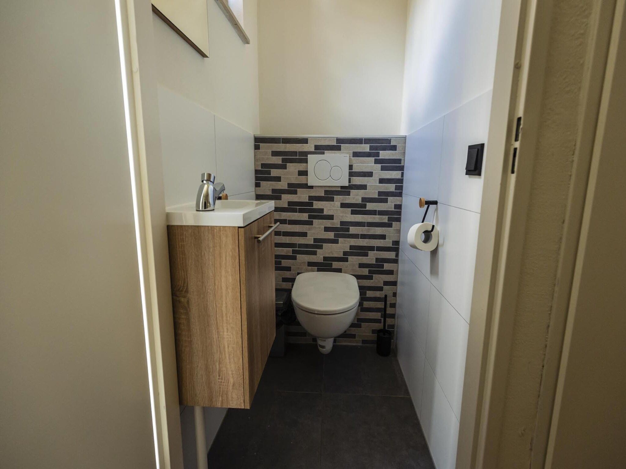 De badkamer van Vakantiepark 't Broeckhuys 8 in Ewijk