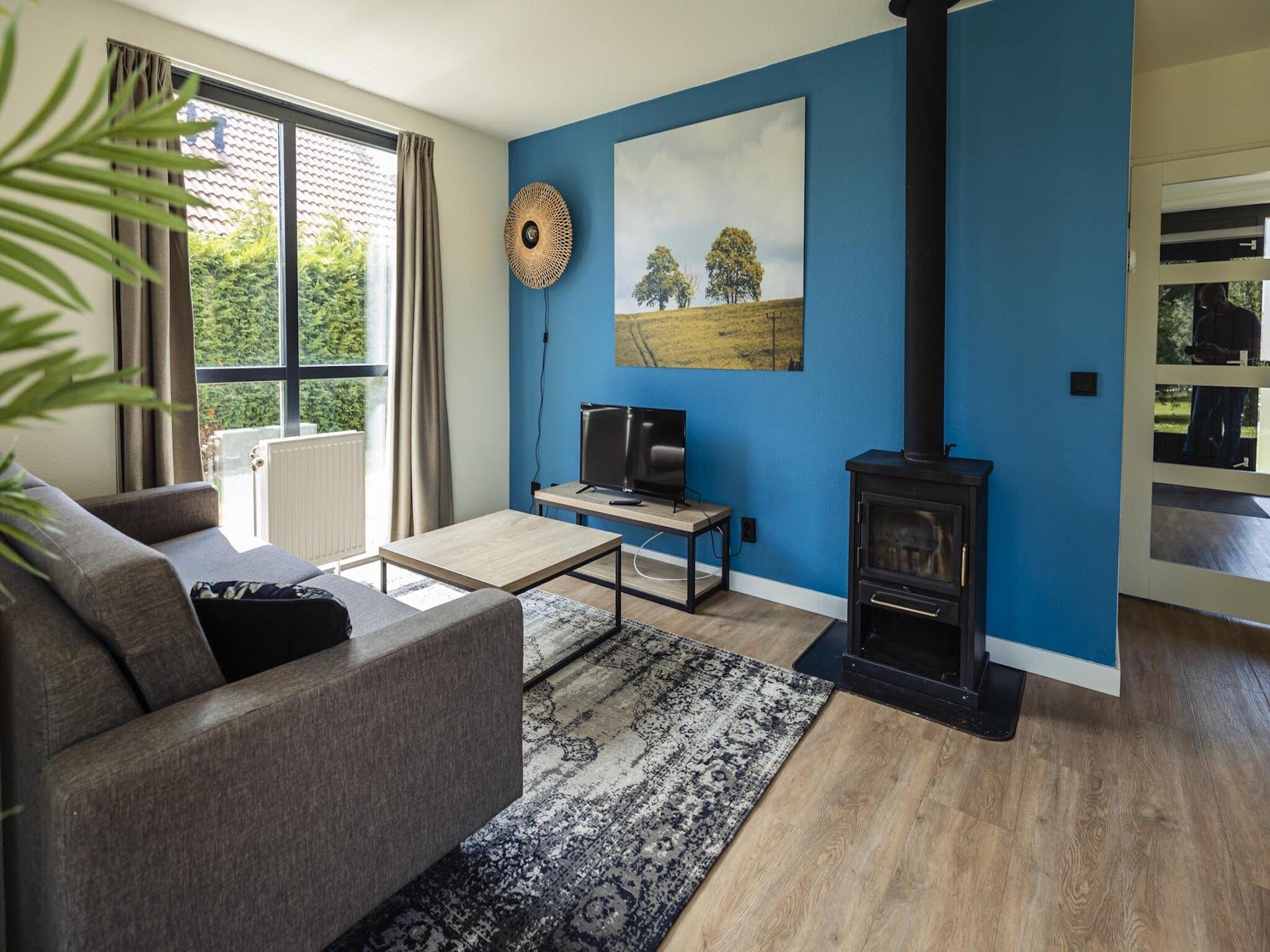 De woonkamer van Vakantiepark 't Broeckhuys 8 in Ewijk