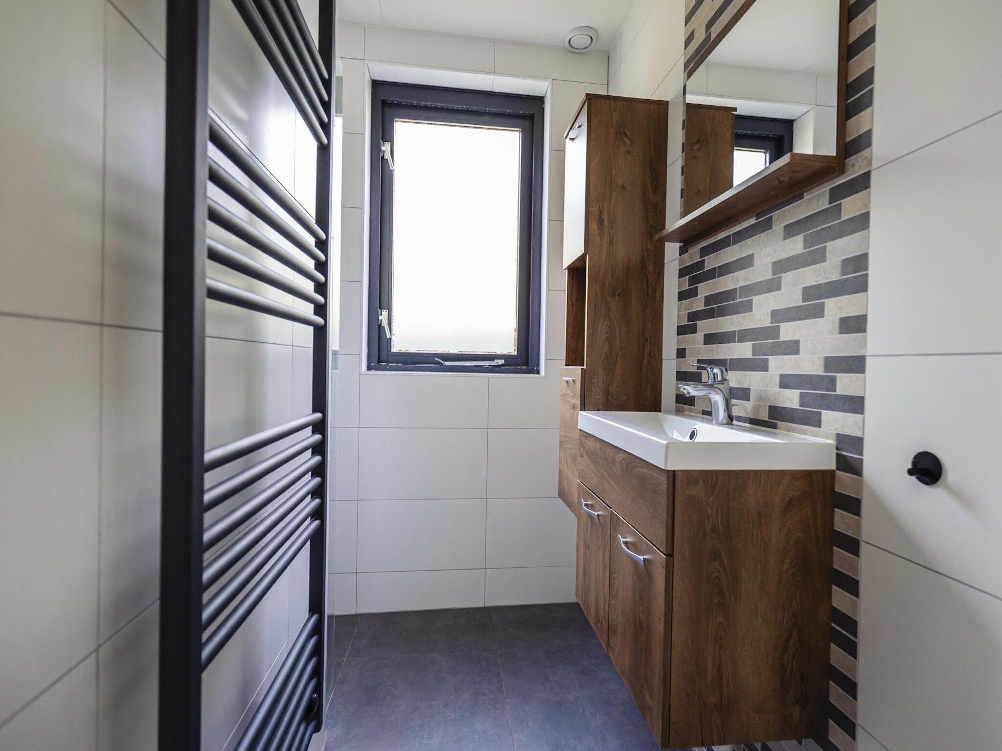 De badkamer van Vakantiepark 't Broeckhuys 8 in Ewijk