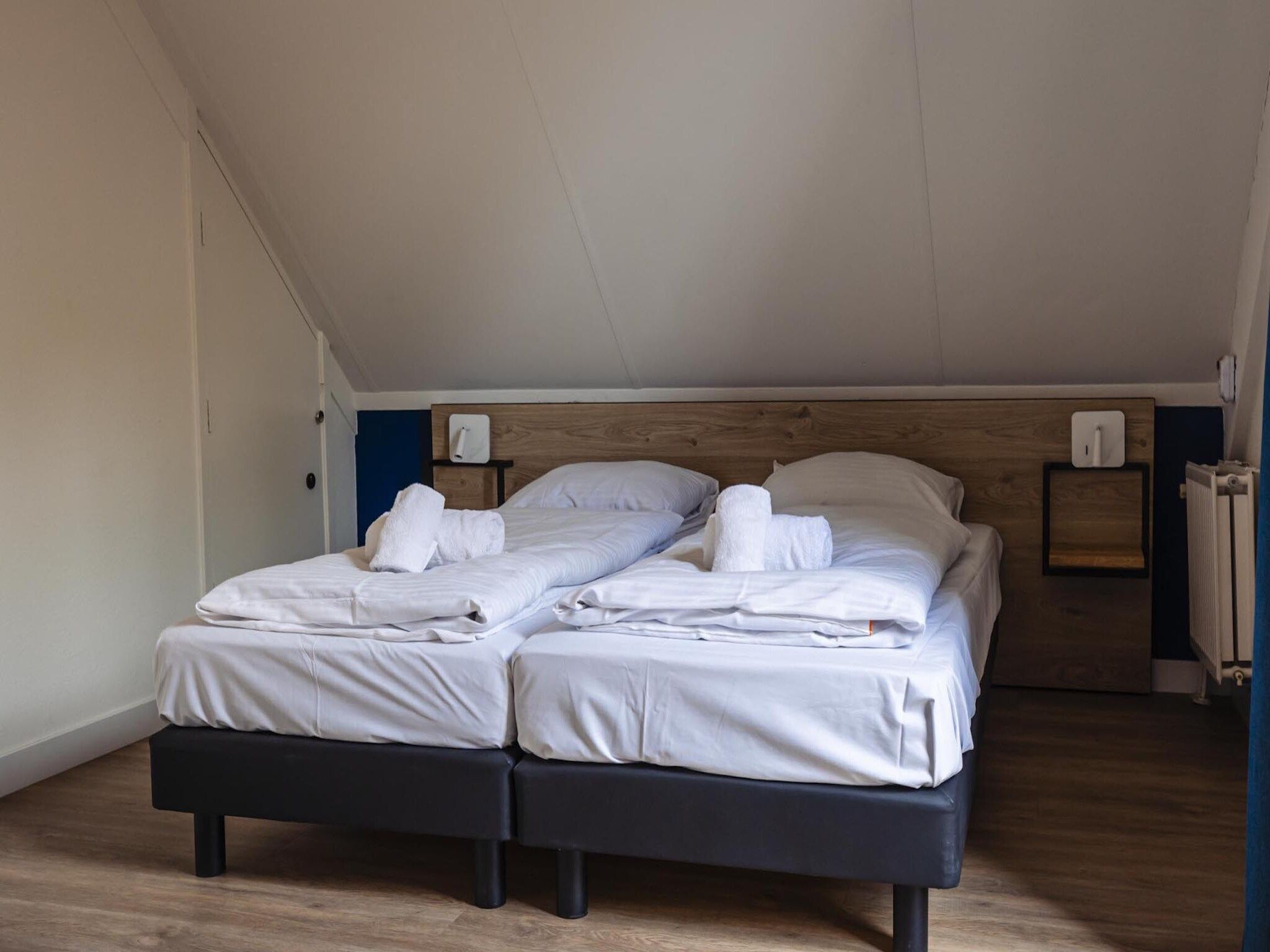 Een slaapkamer van Vakantiepark 't Broeckhuys 8 in Ewijk