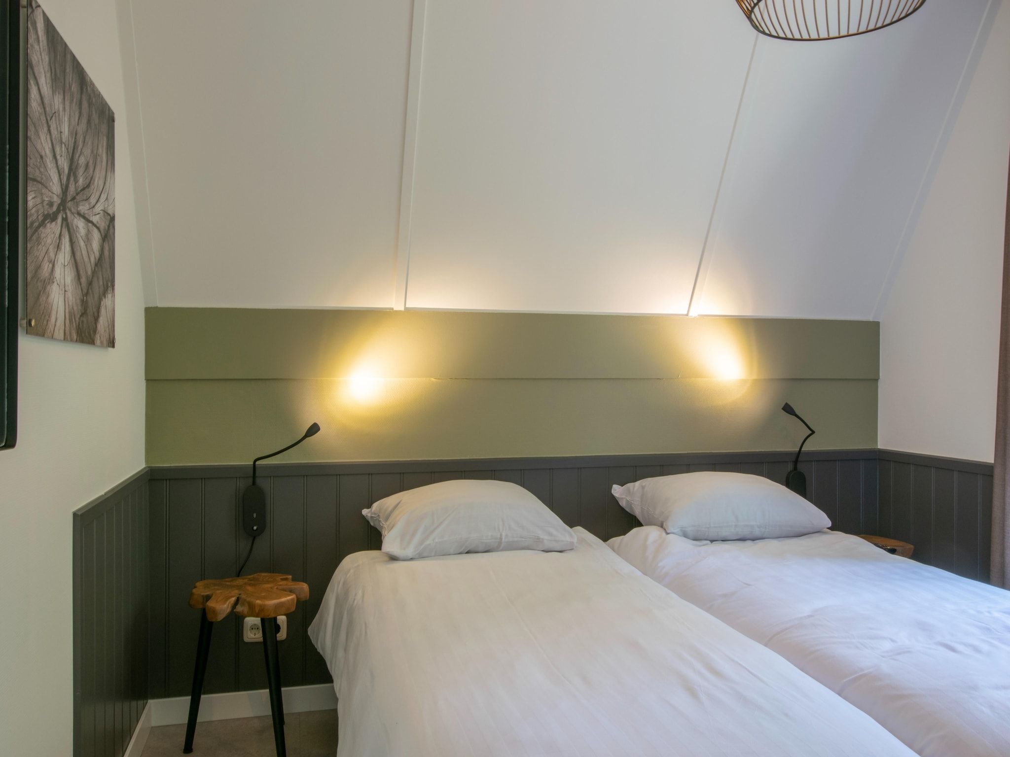 Een slaapkamer van Vakantiepark de Katjeskelder 24 in Oosterhout