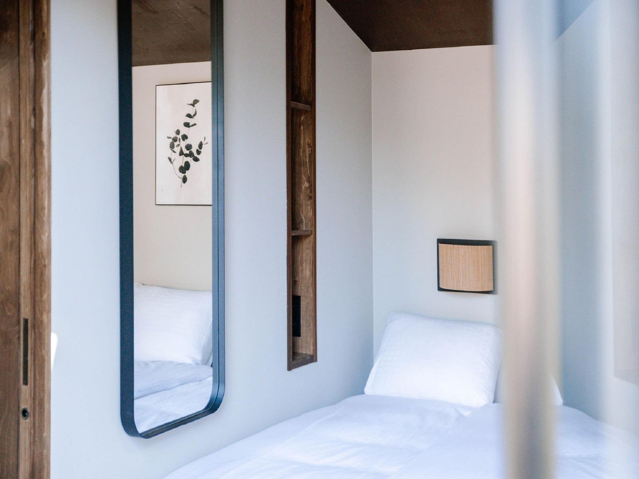 Een slaapkamer van Landgoed De IJsvogel 12 in Voorthuizen