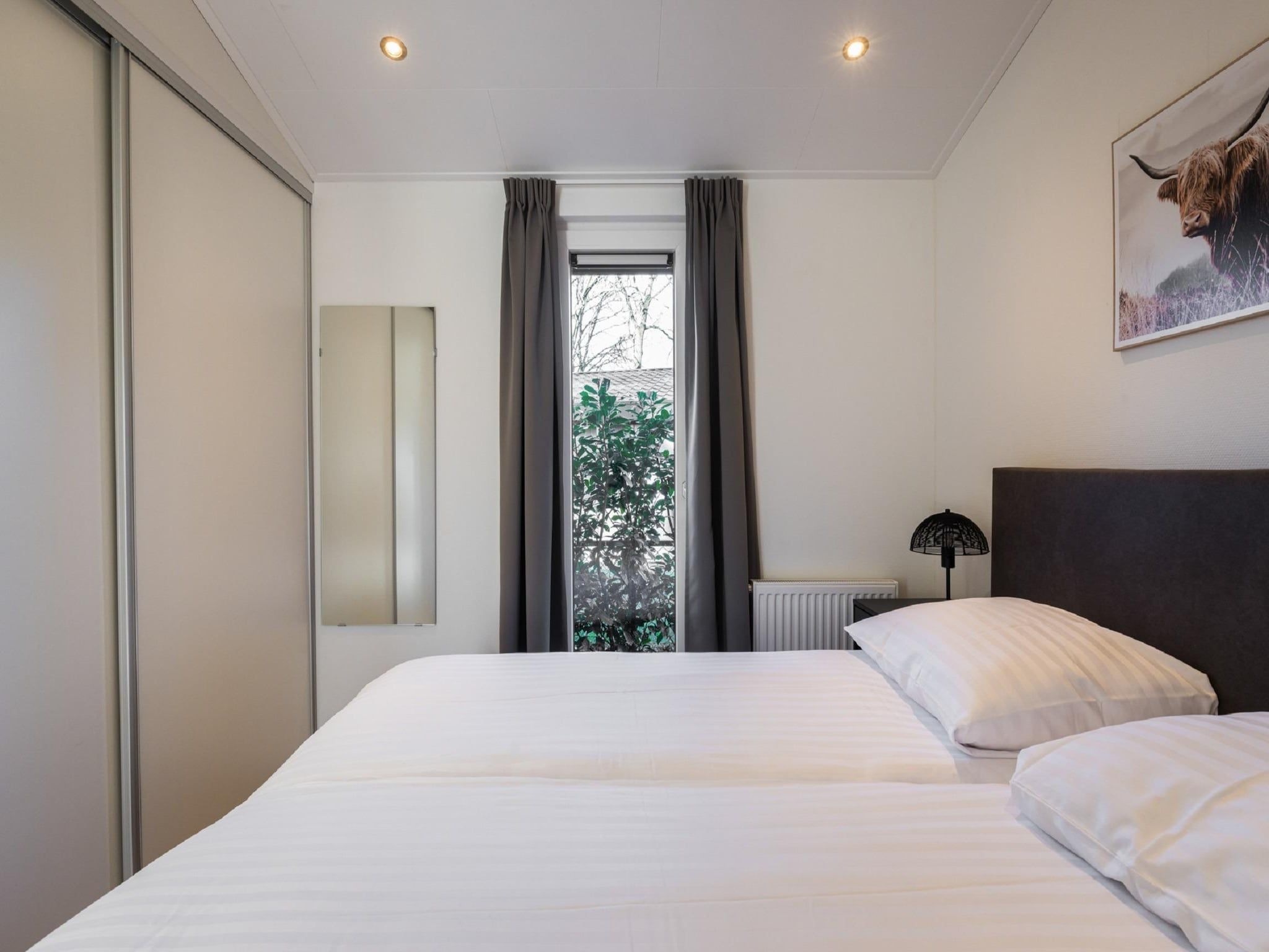 Een slaapkamer van Vakantiepark Latour 8 in Oirschot