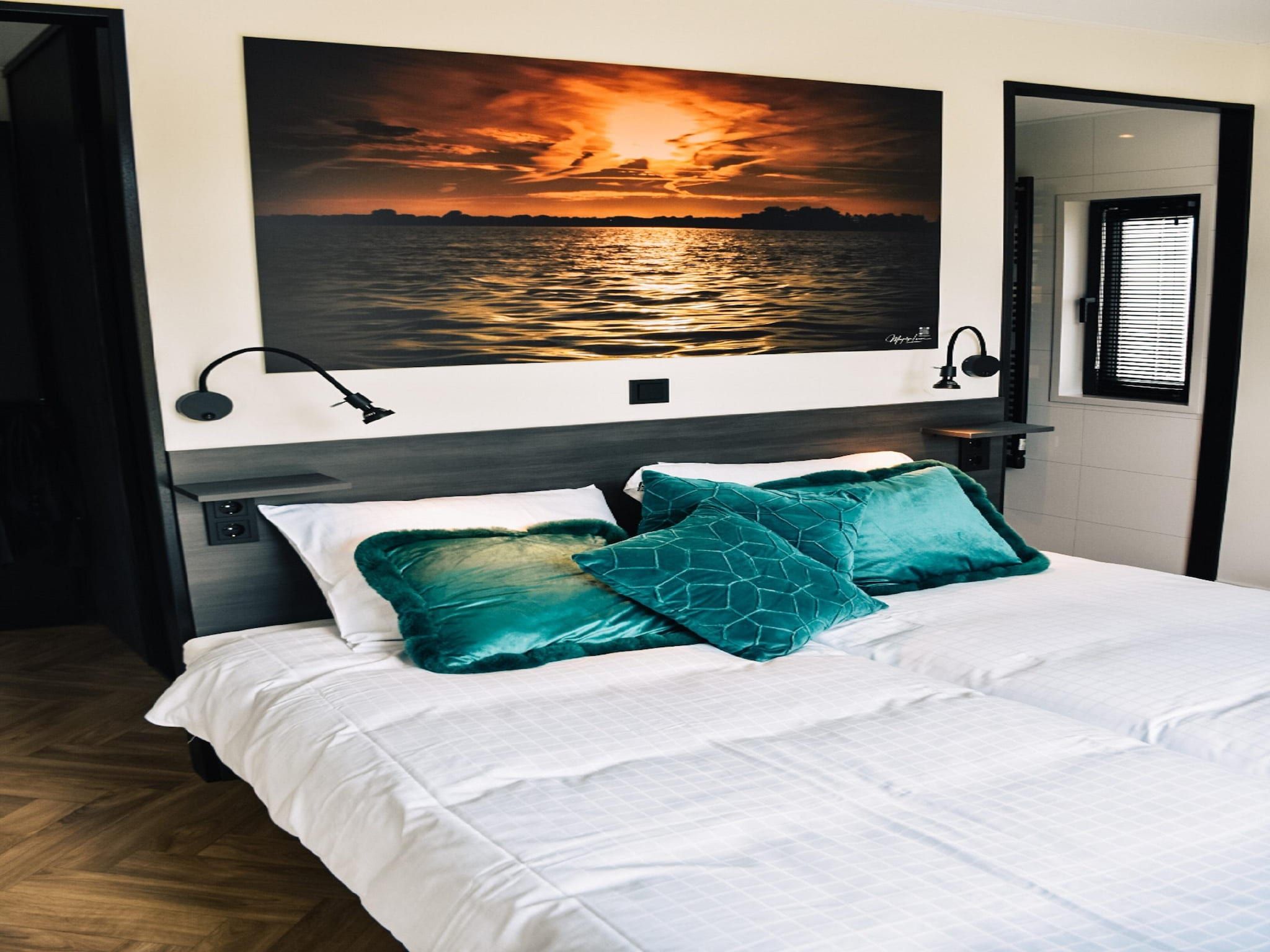 Een slaapkamer van MarinaPark Nieuw Loosdrecht 1 in Nieuw-Loosdrecht