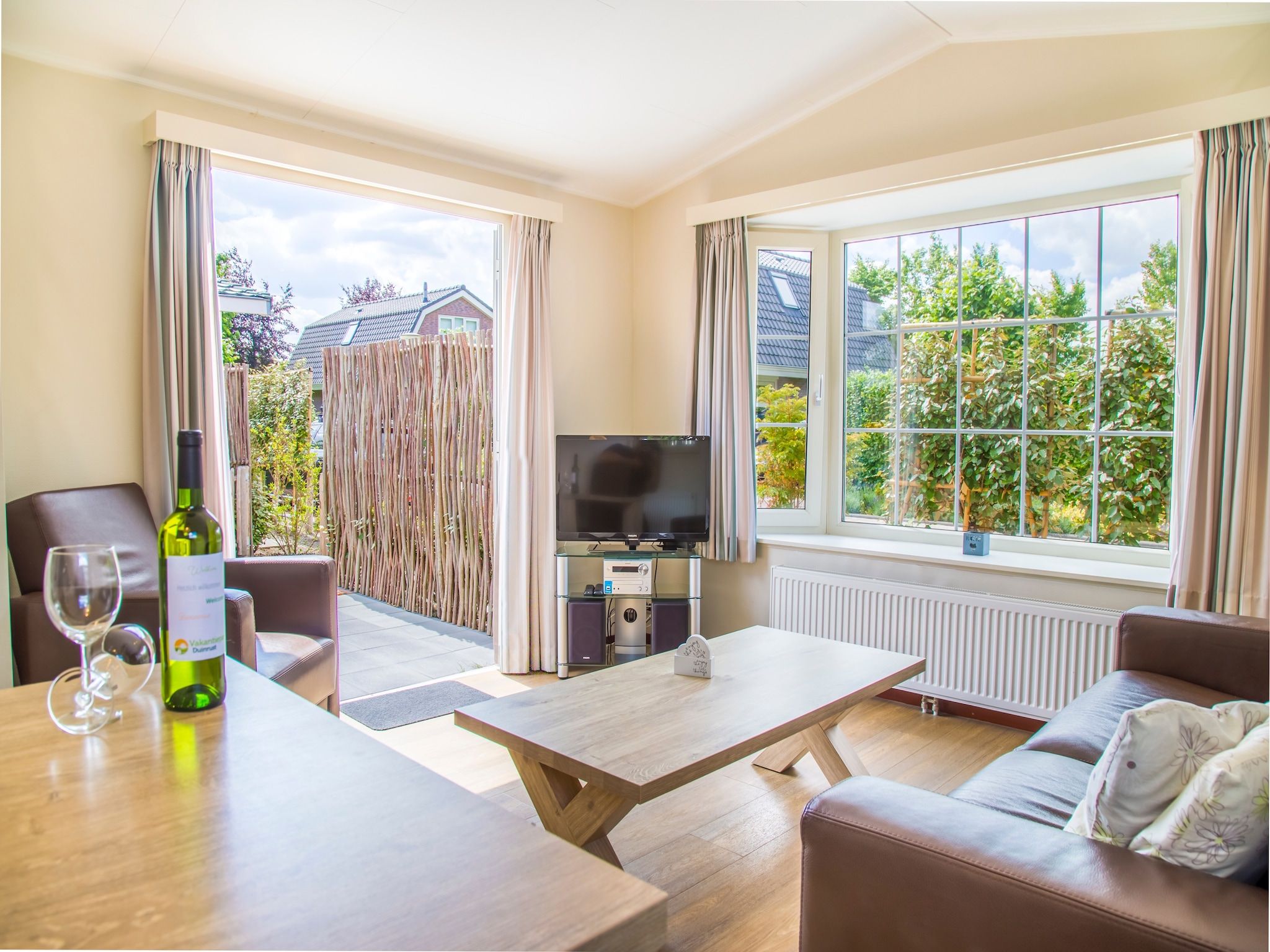 De woonkamer van Vakantiepark Duinrust 3 in Noordwijk aan zee