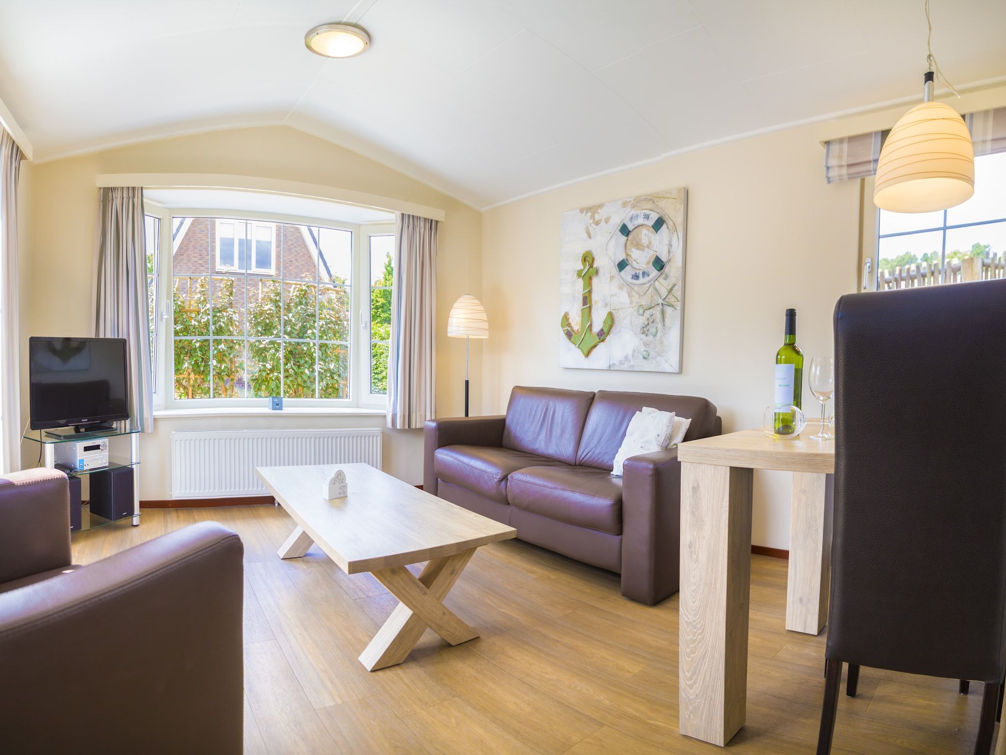 De woonkamer van Vakantiepark Duinrust 3 in Noordwijk aan zee