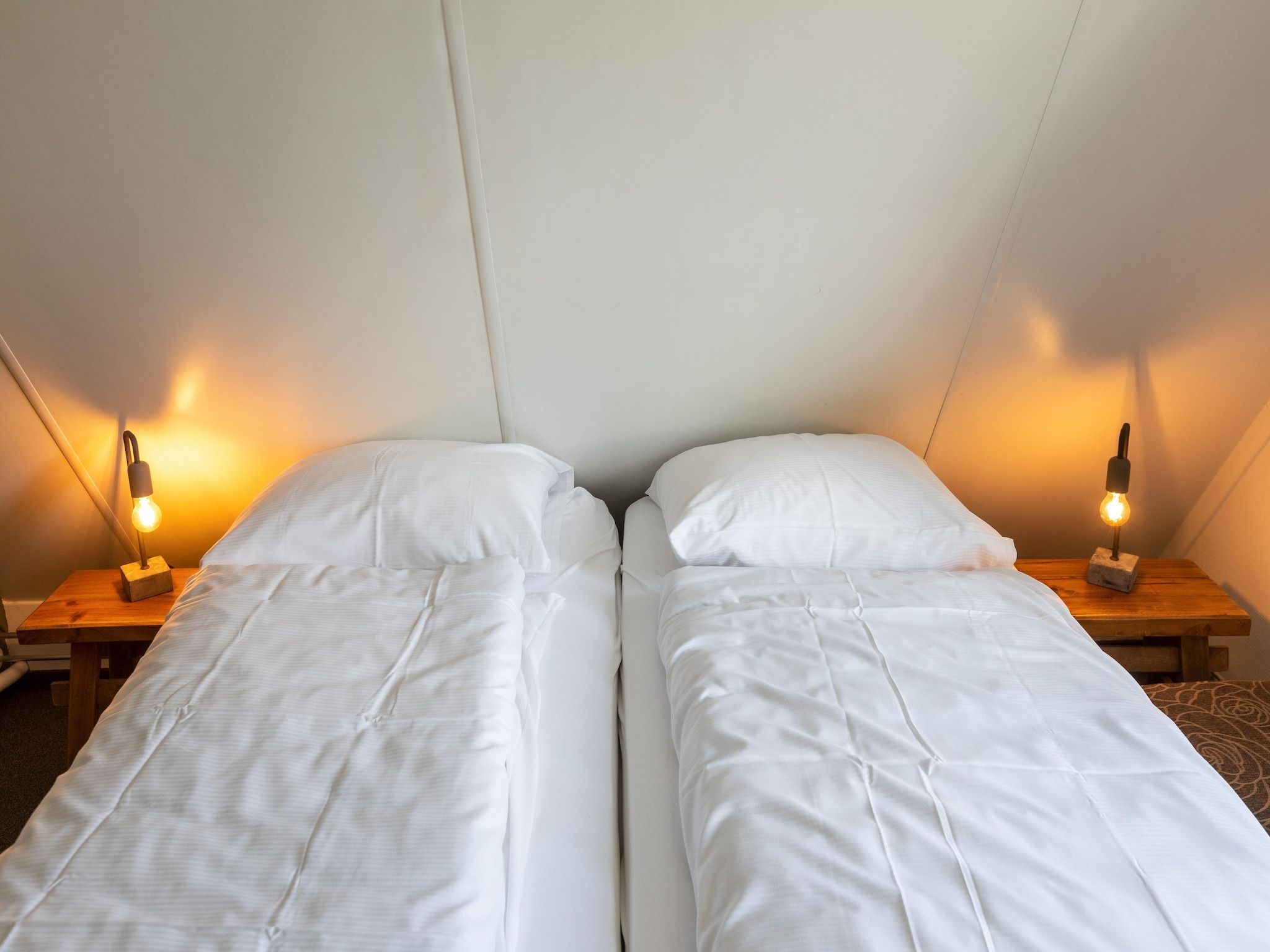 Een slaapkamer van Vakantie bij Meeussen - Molendal 3 in Plasmolen