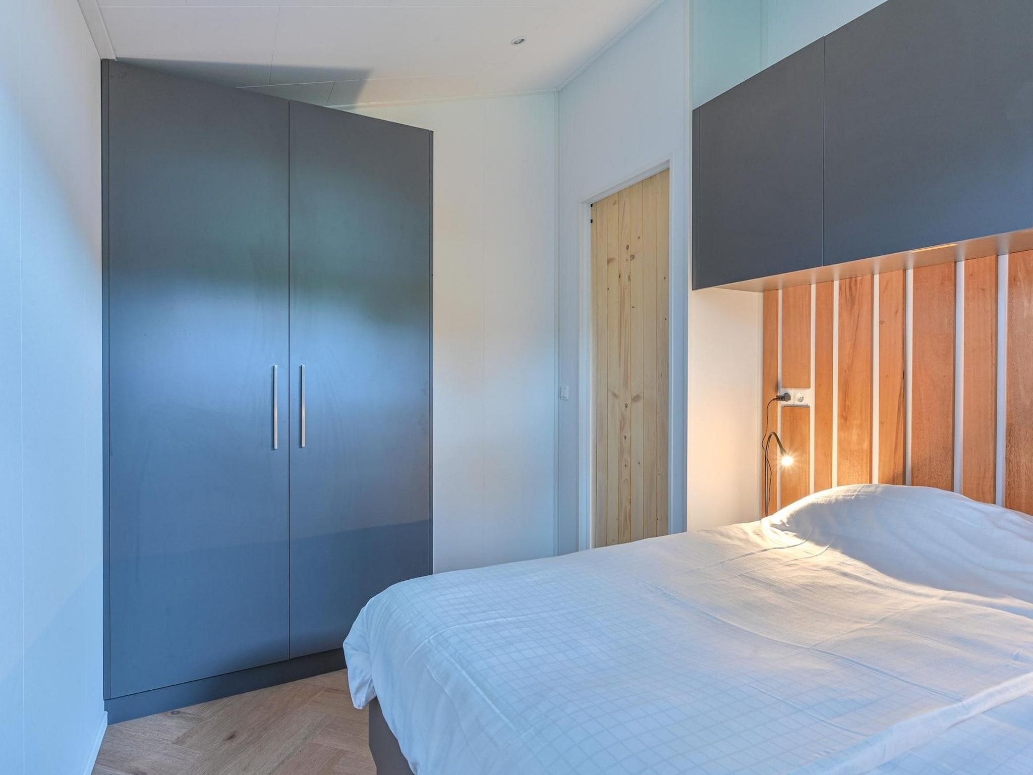 Een slaapkamer van Resort Drentse Weelde 1 in Hoogersmilde