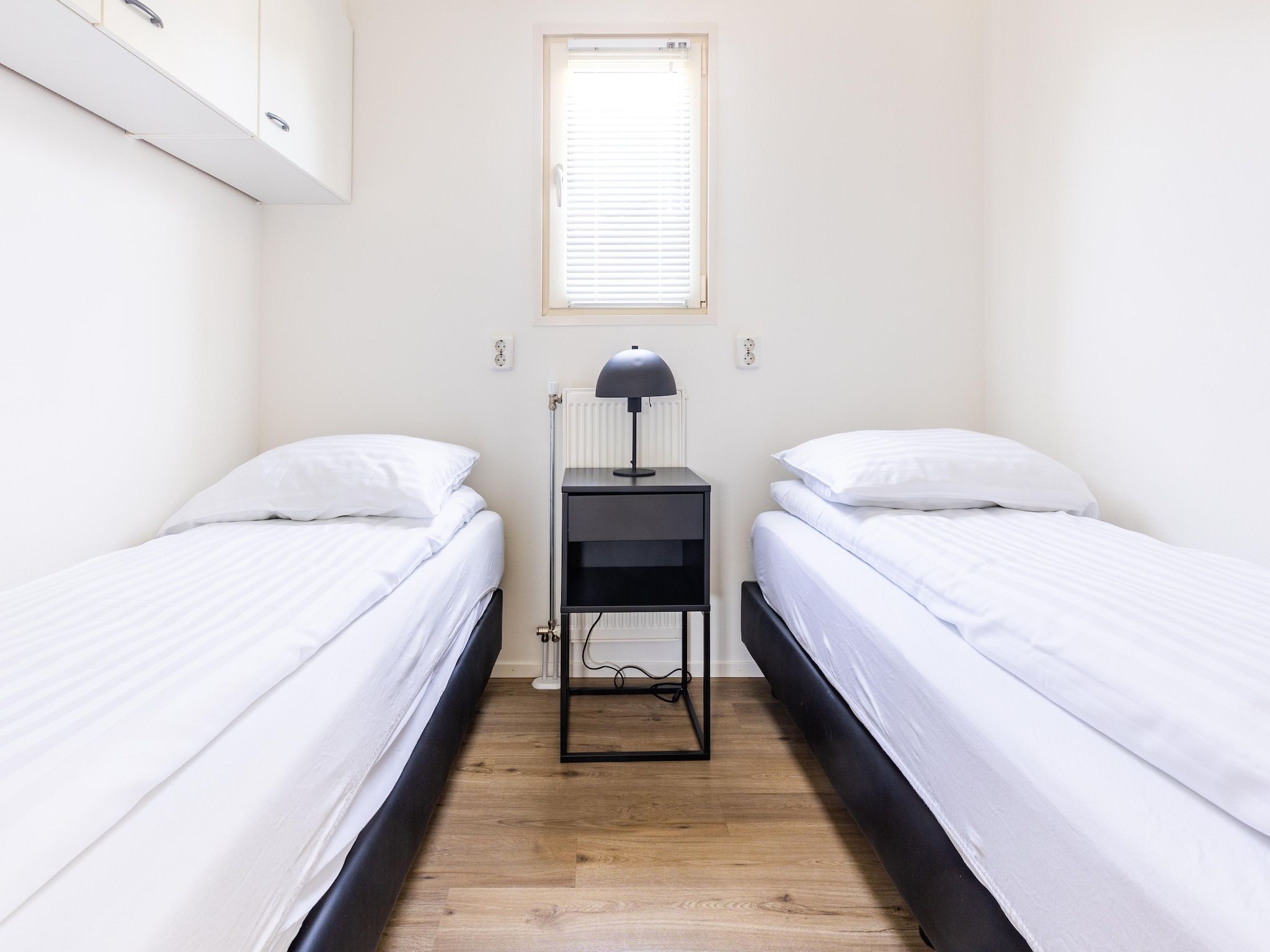 Een slaapkamer van Vakantiepark Molenvelden 9 in Veldhoven