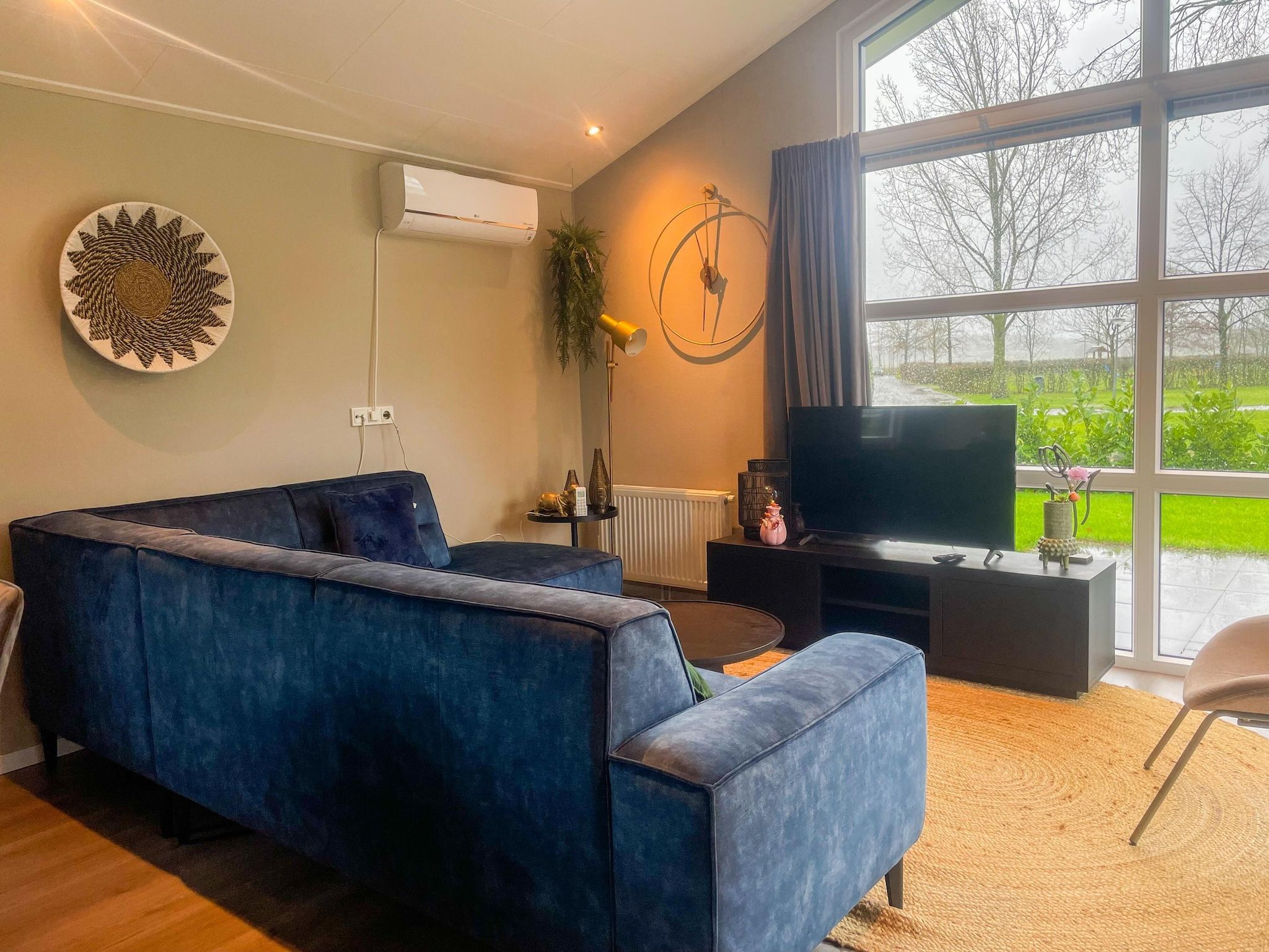 De woonkamer van Vakantiepark Molenvelden 10 in Veldhoven