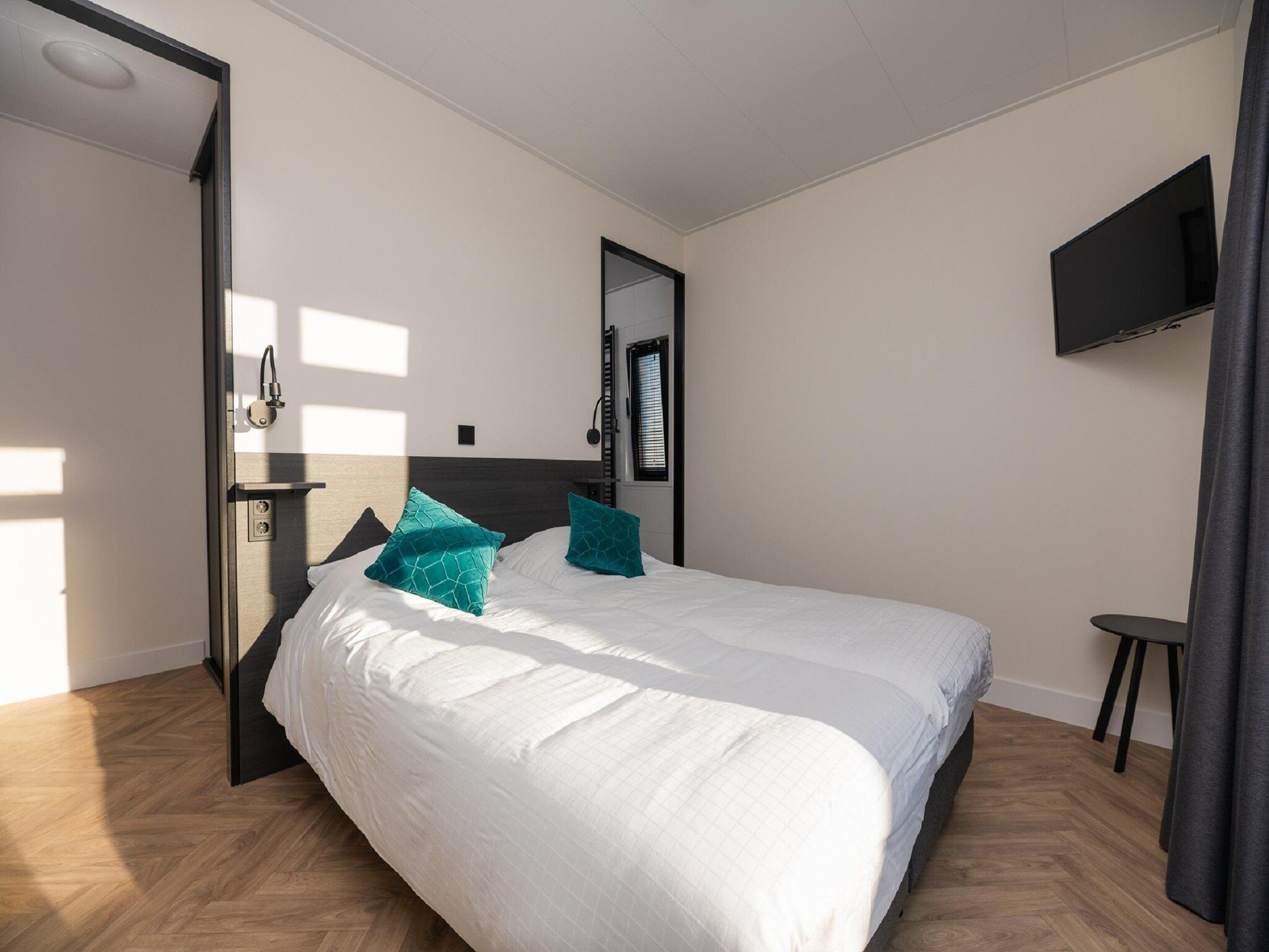Een slaapkamer van MarinaPark Nieuw Loosdrecht 3 in Nieuw-Loosdrecht