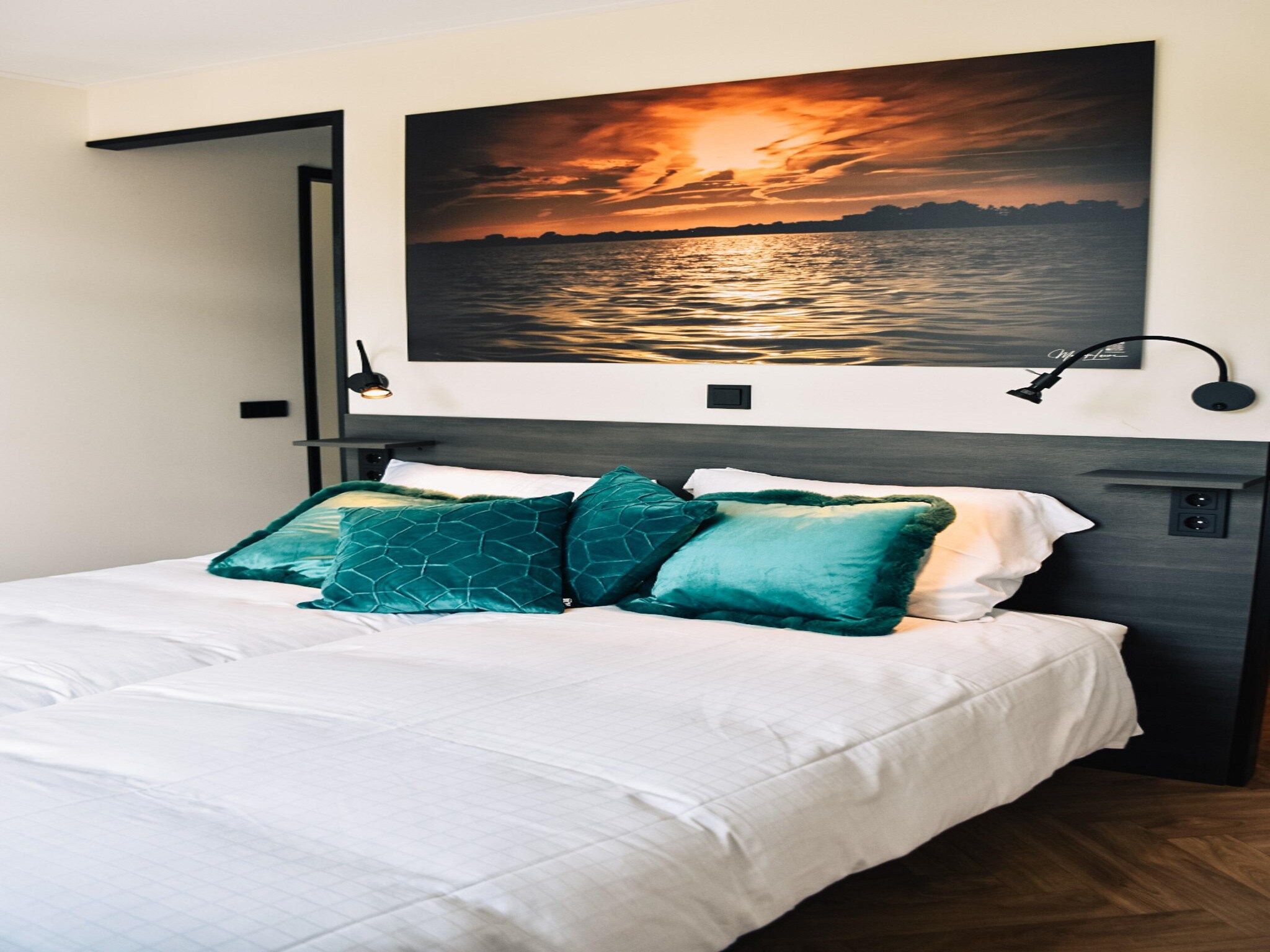 Een slaapkamer van MarinaPark Nieuw Loosdrecht 3 in Nieuw-Loosdrecht