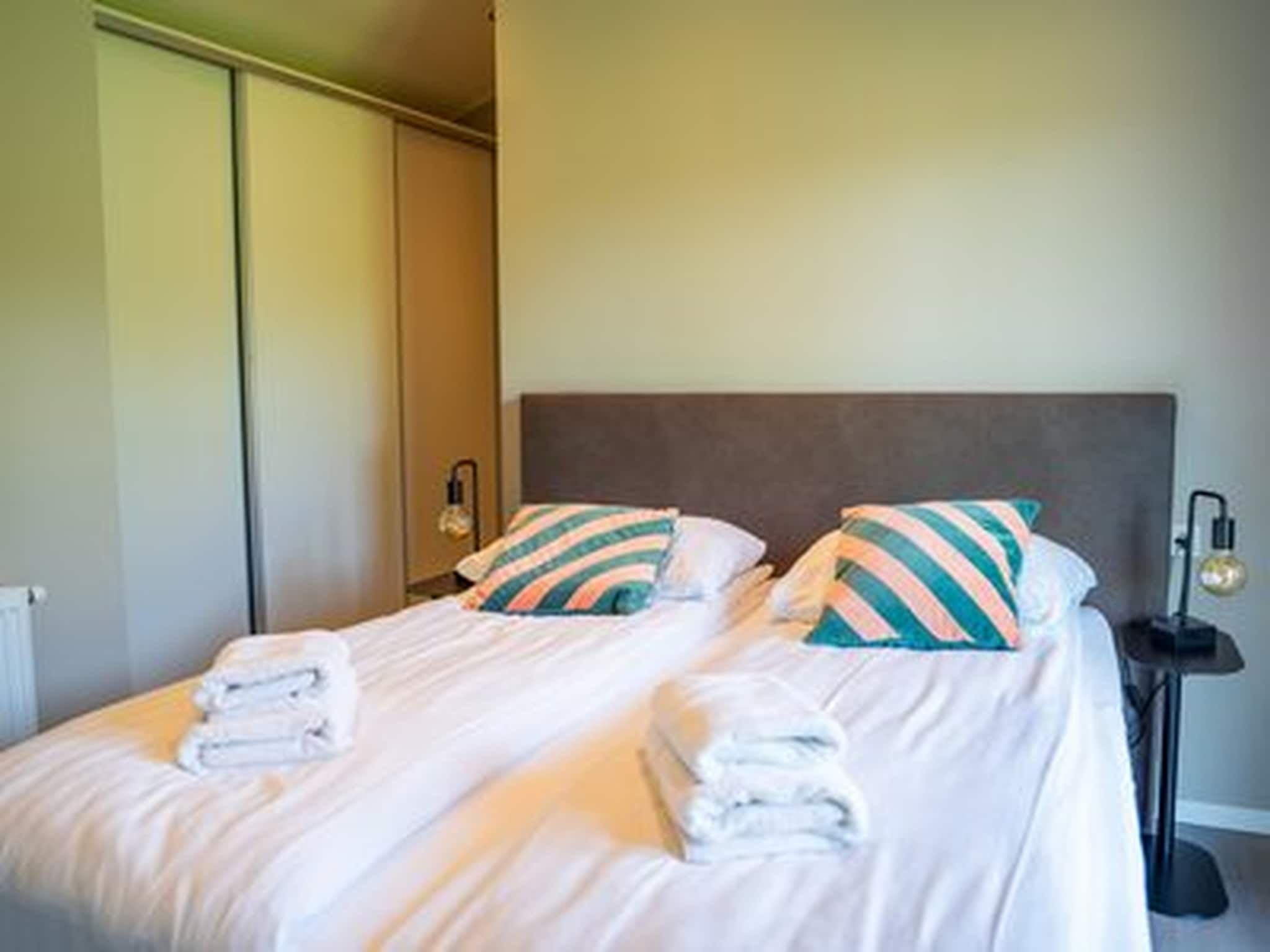 Een slaapkamer van Vakantiepark Molenvelden 11 in Veldhoven