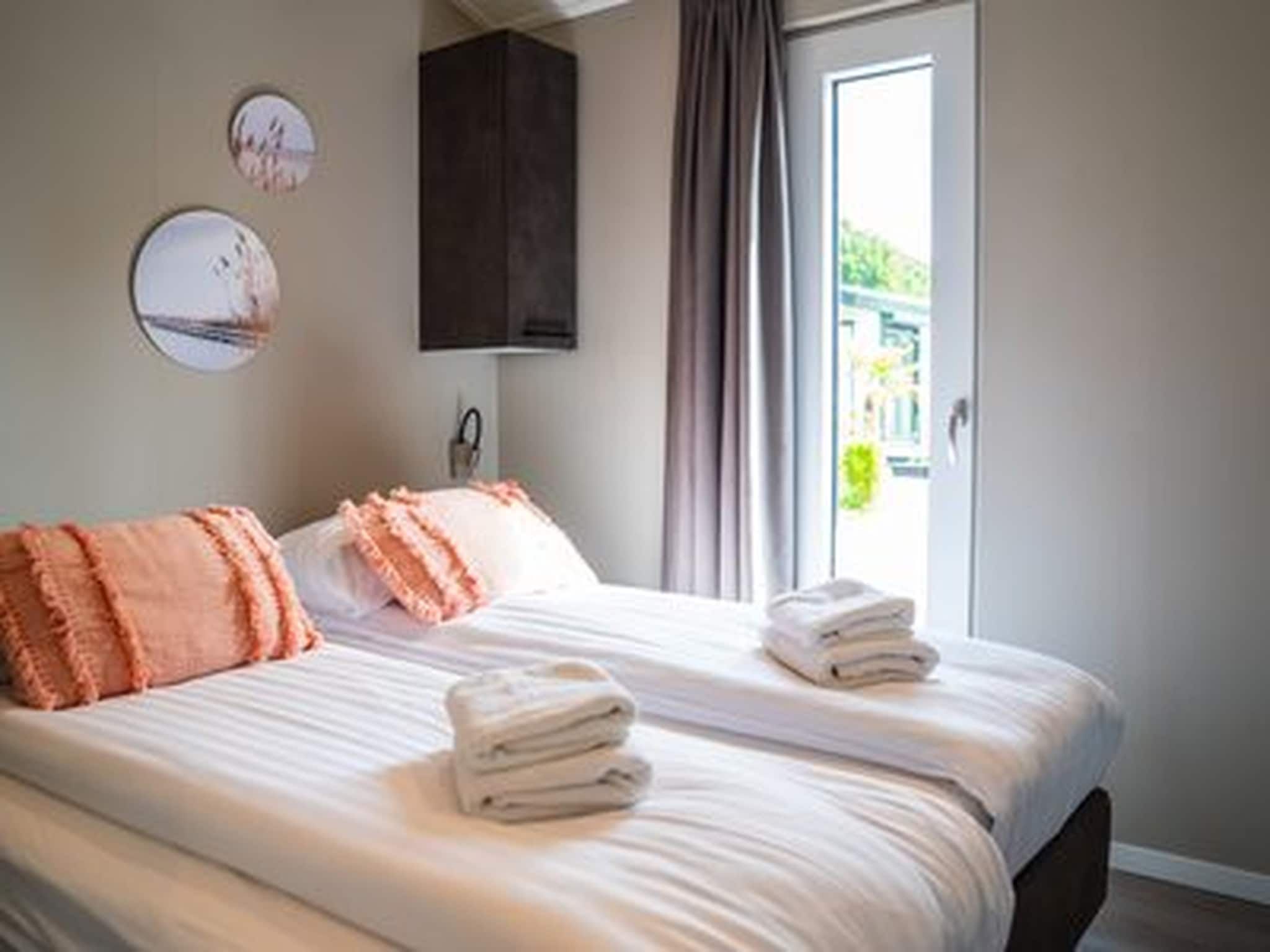 Een slaapkamer van Vakantiepark Molenvelden 11 in Veldhoven