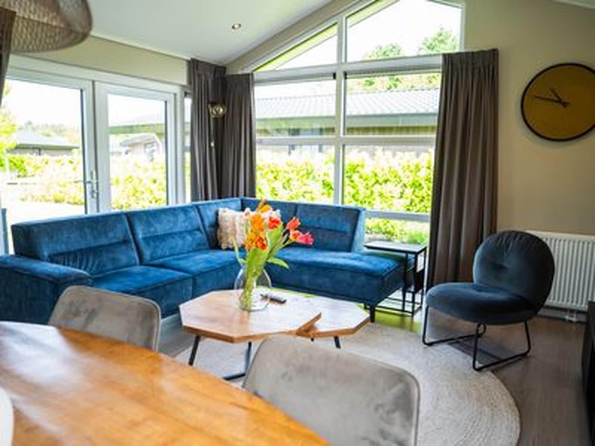 De woonkamer van Vakantiepark Molenvelden 11 in Veldhoven