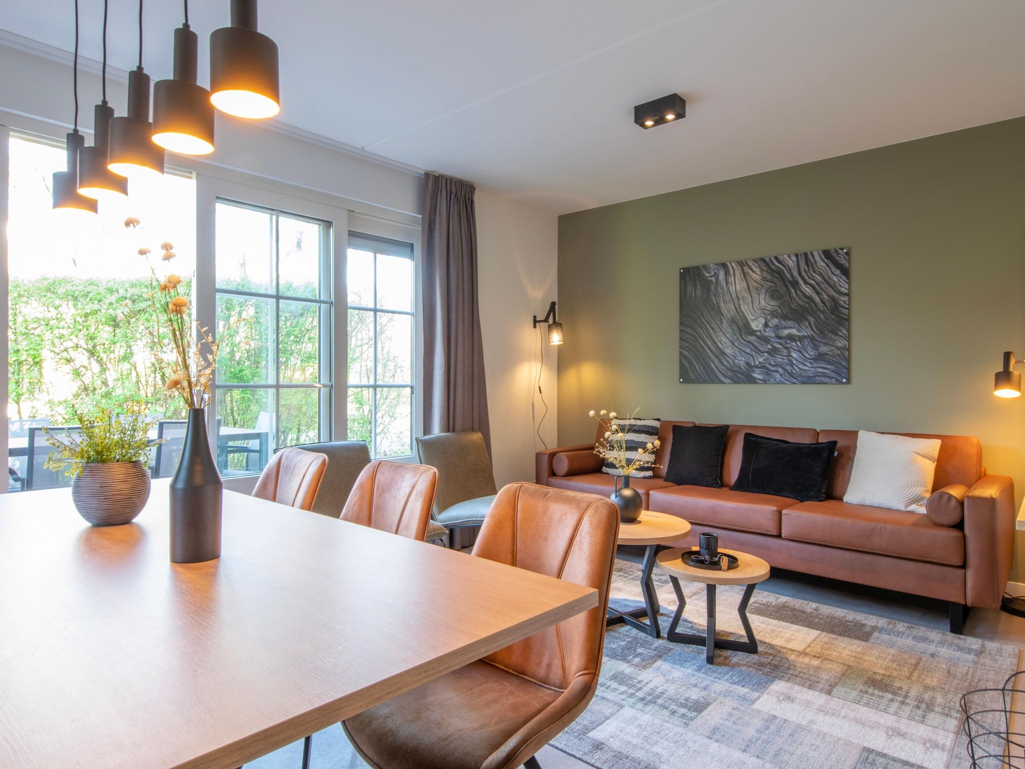 De woonkamer van Vakantiepark de Katjeskelder 25 in Oosterhout