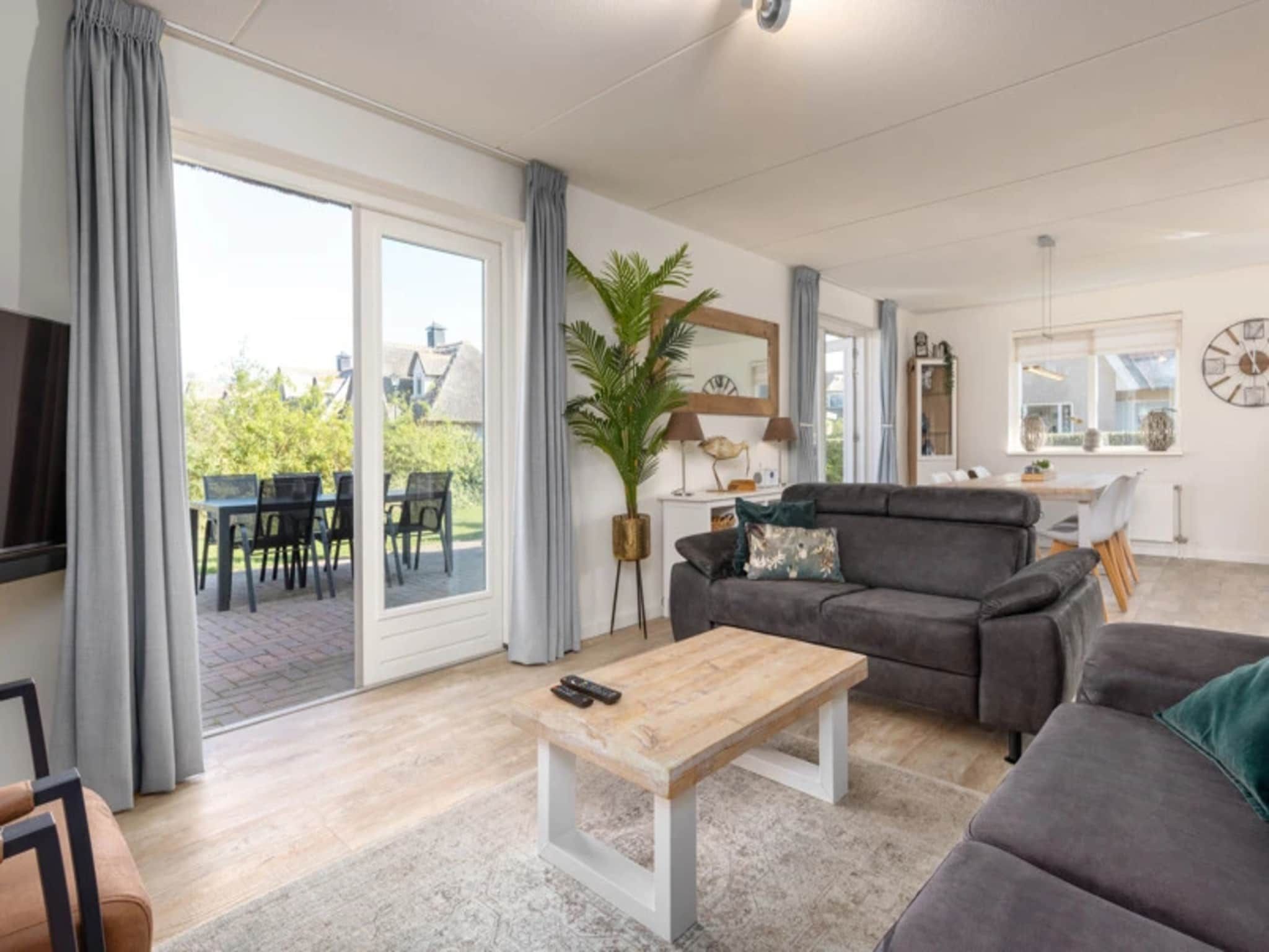 De woonkamer van Vakantiepark Duynzicht 2 in Julianadorp aan zee