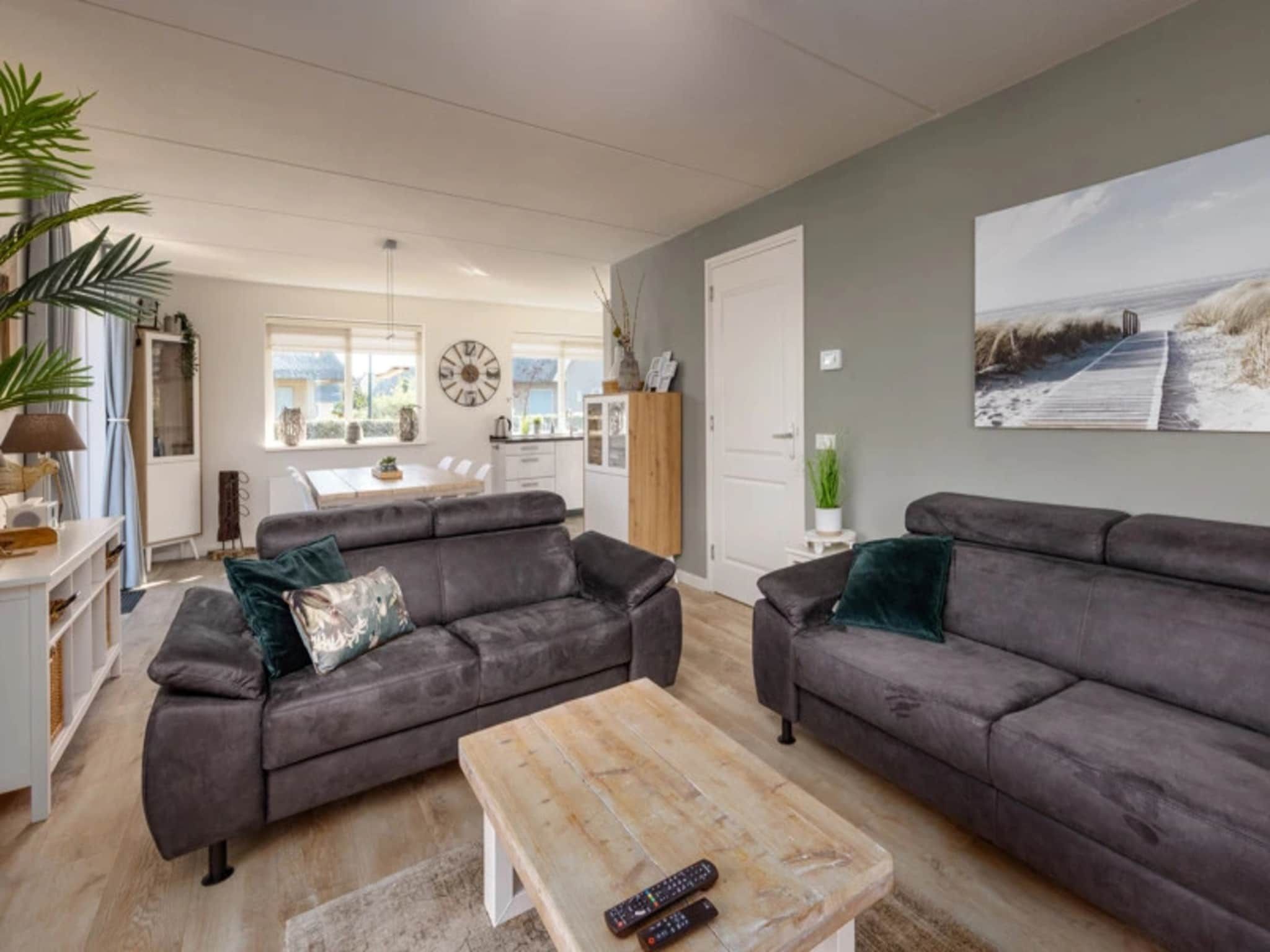 De woonkamer van Vakantiepark Duynzicht 2 in Julianadorp aan zee