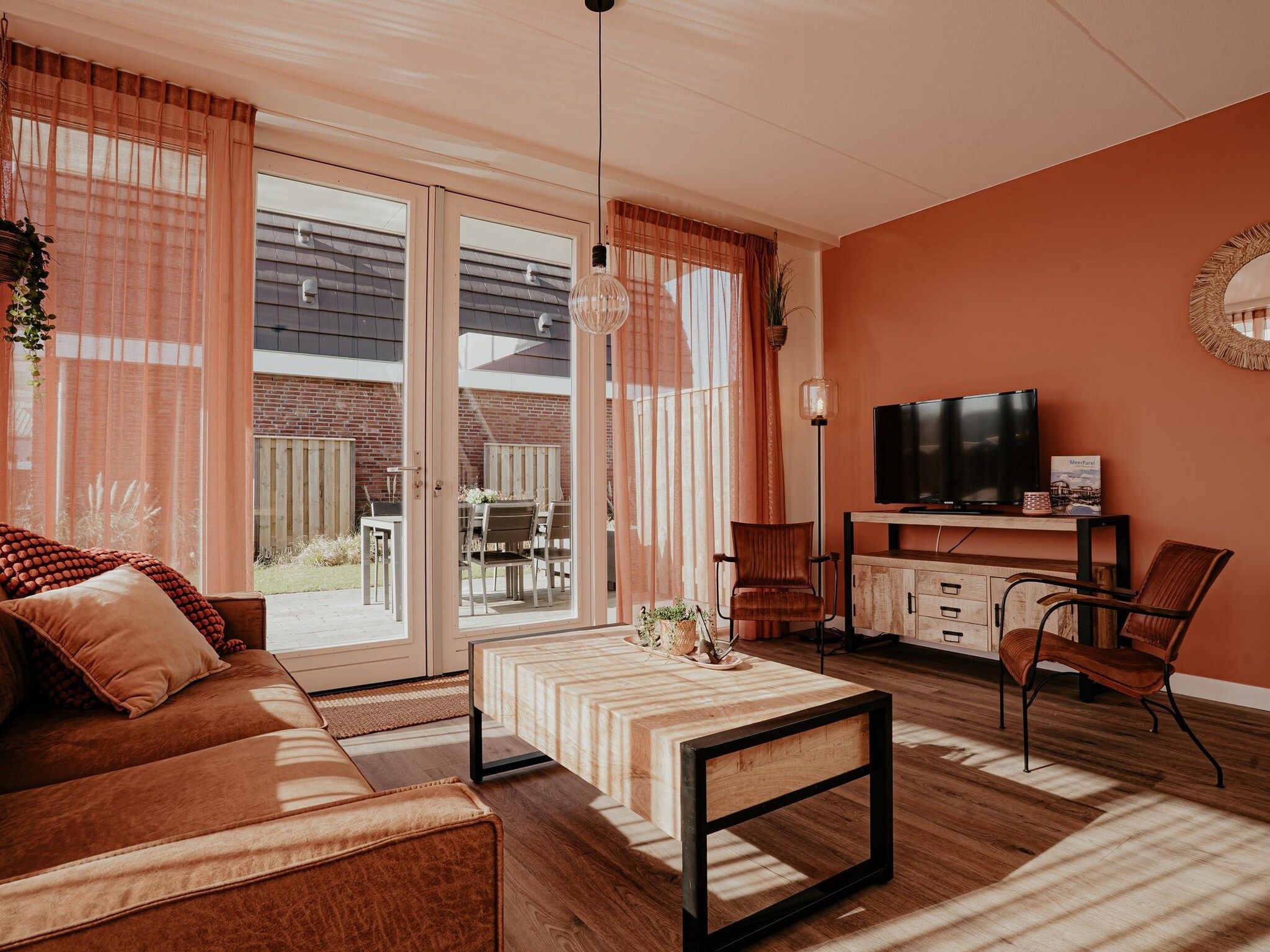 De woonkamer van Waterpark de Meerparel 14 in Uitgeest