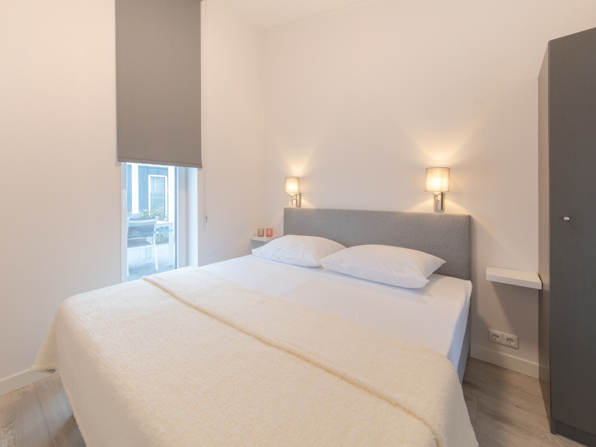 Een slaapkamer van Water Resort Oosterschelde 45 in Wemeldinge