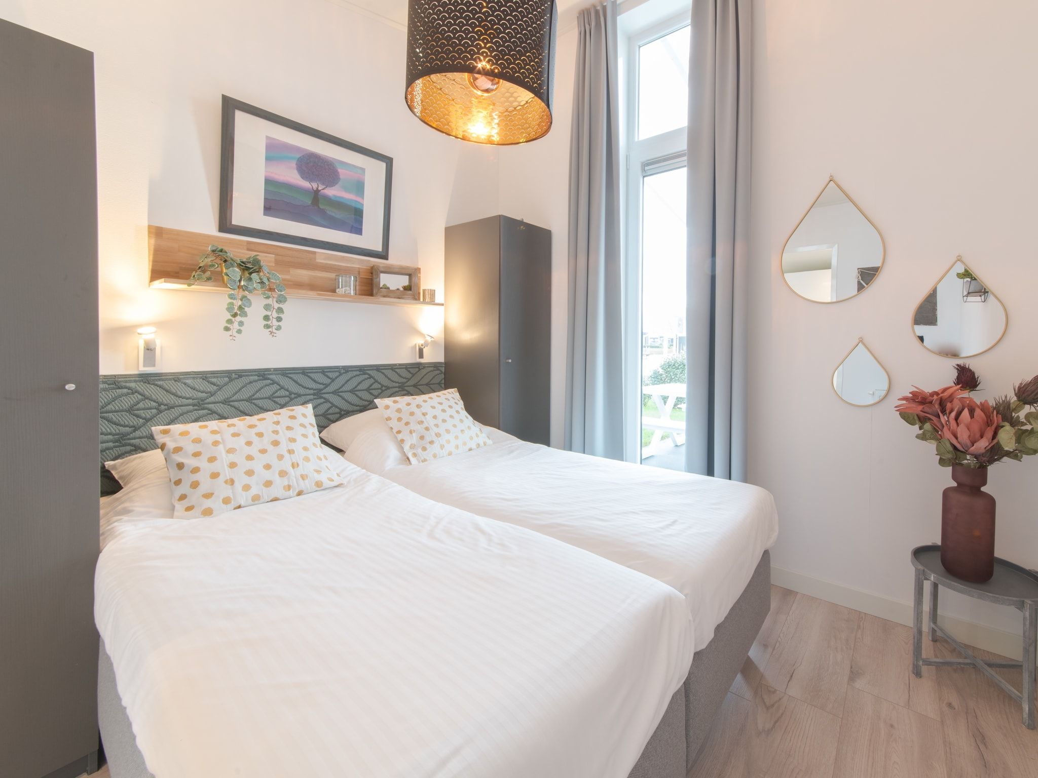 Een slaapkamer van Water Resort Oosterschelde 34 in Wemeldinge