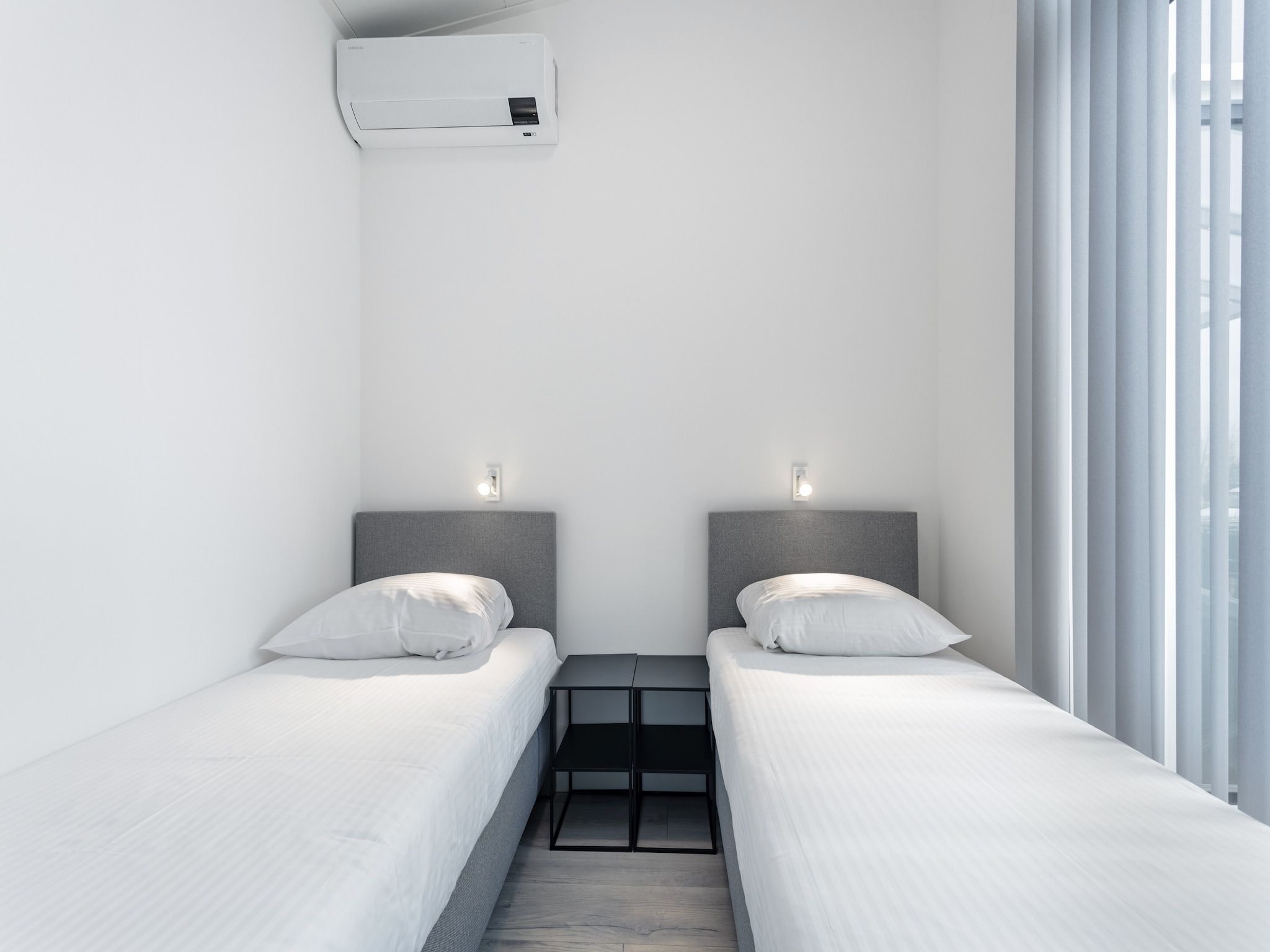 Een slaapkamer van Water Resort Oosterschelde 12 in Wemeldinge