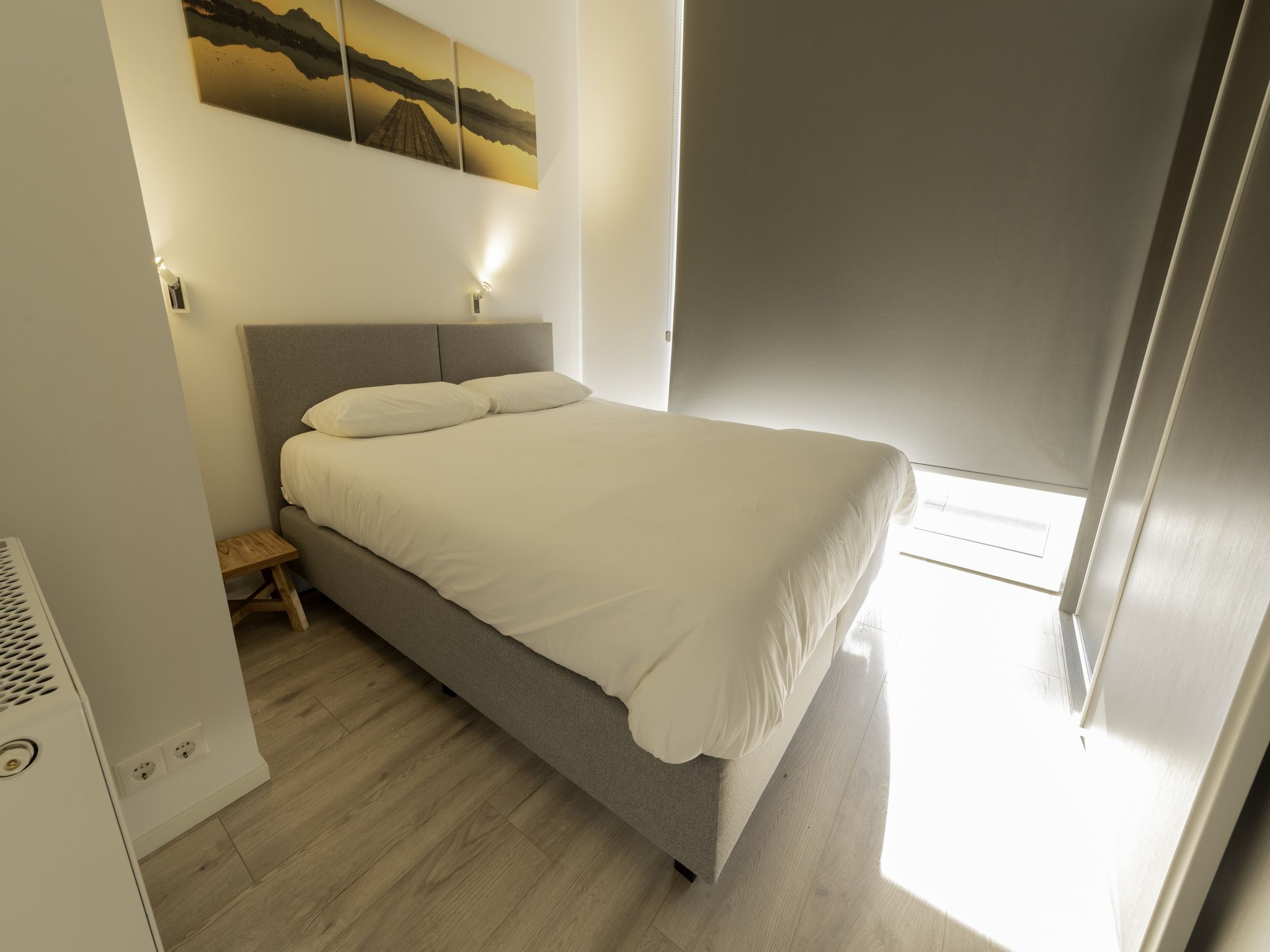 Een slaapkamer van Water Resort Oosterschelde 28 in Wemeldinge