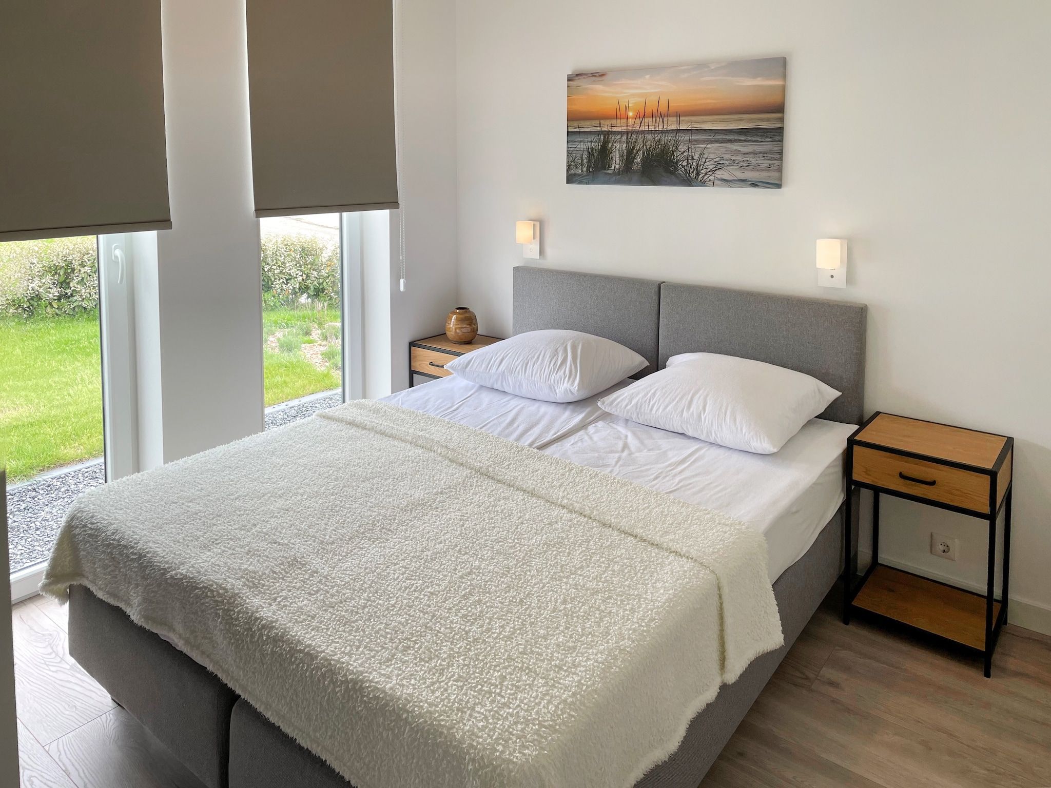 Een slaapkamer van Water Resort Oosterschelde 83 in Wemeldinge