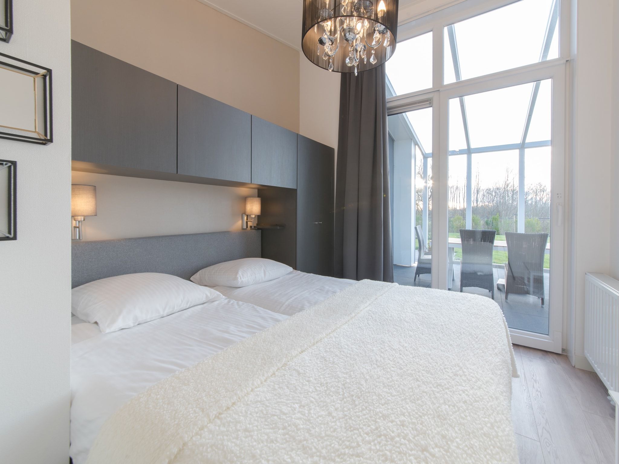 Een slaapkamer van Water Resort Oosterschelde 109 in Wemeldinge