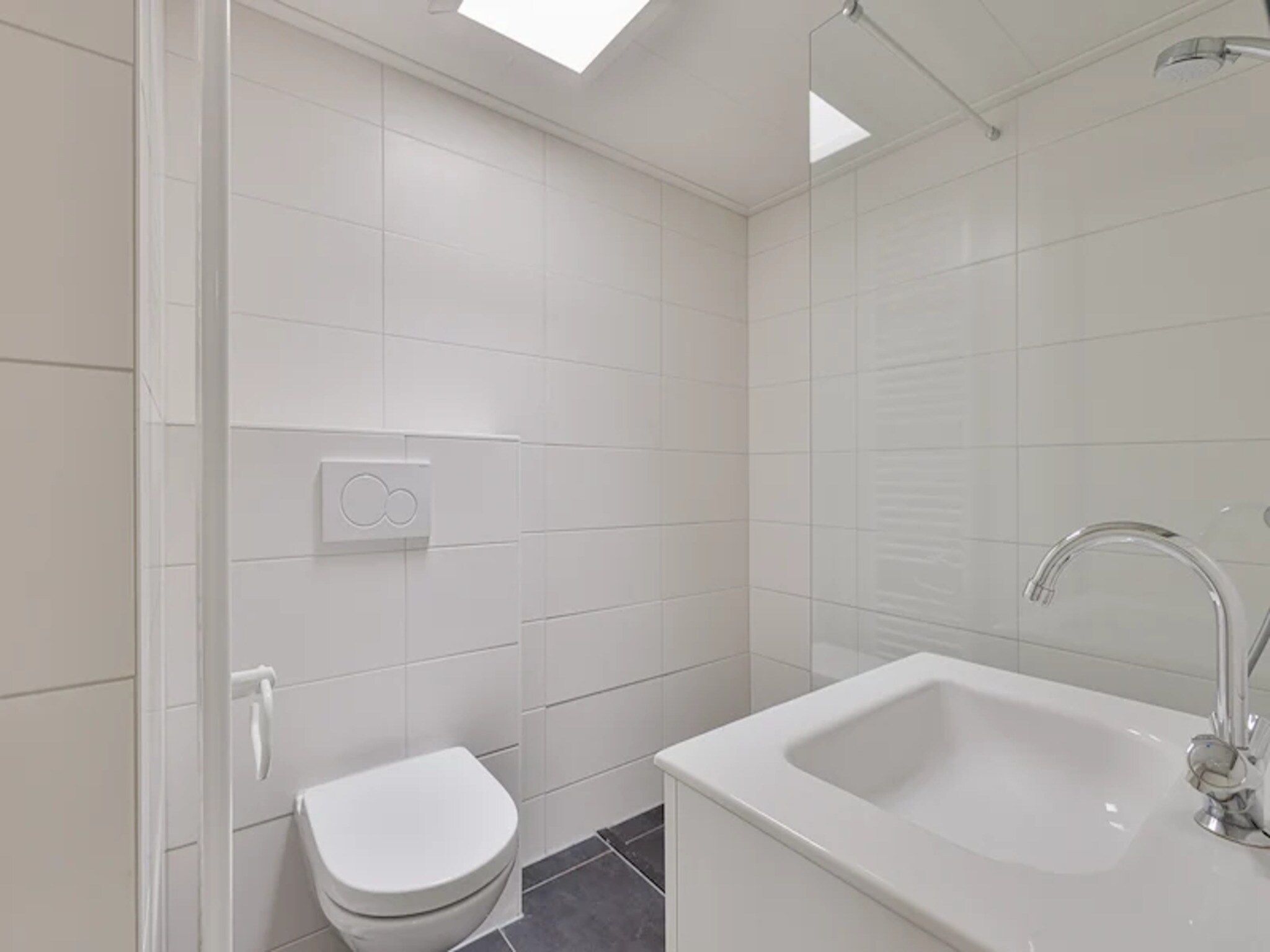 De badkamer van Vakantiepark de Berkenhorst 13 in Kootwijk