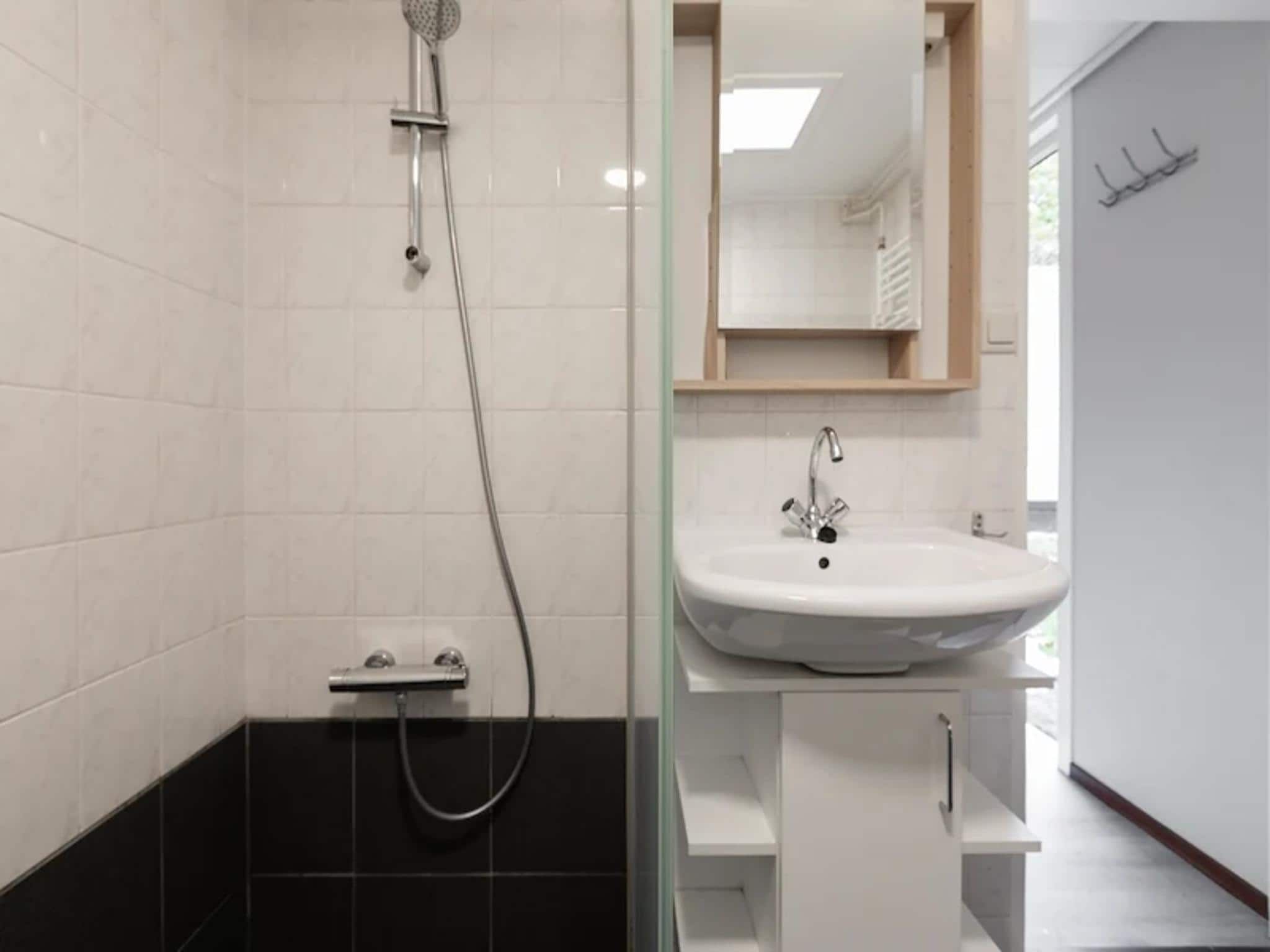 De badkamer van Vakantiepark de Berkenhorst 17 in Kootwijk