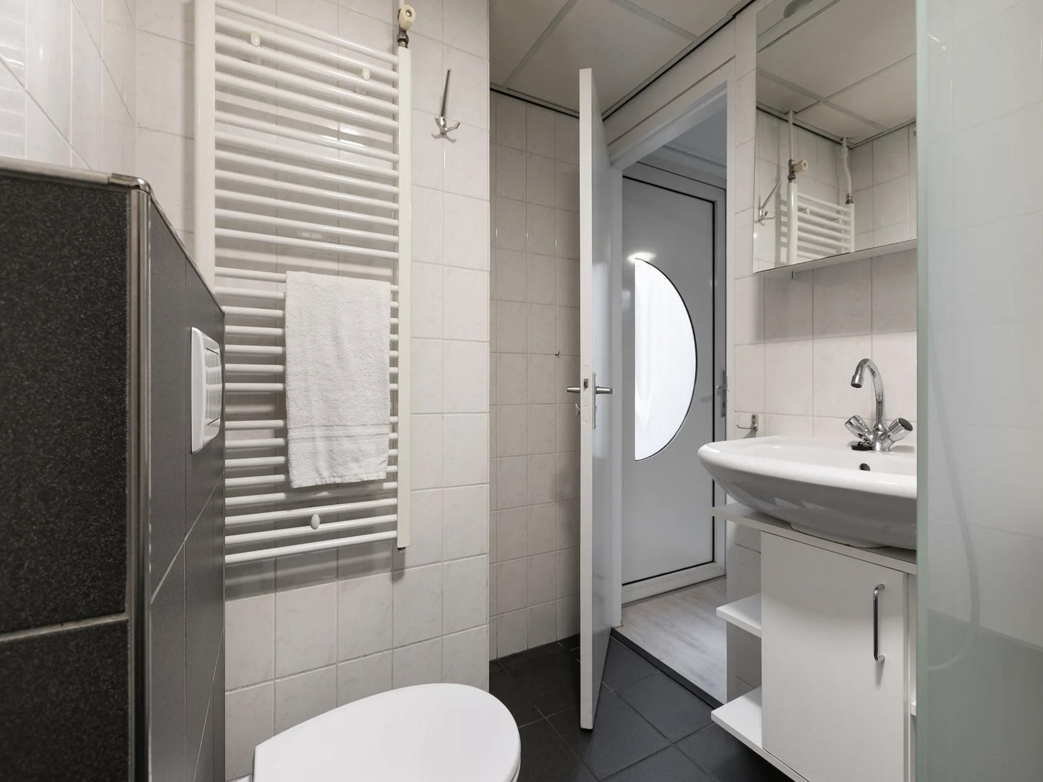 De badkamer van Vakantiepark de Berkenhorst 19 in Kootwijk