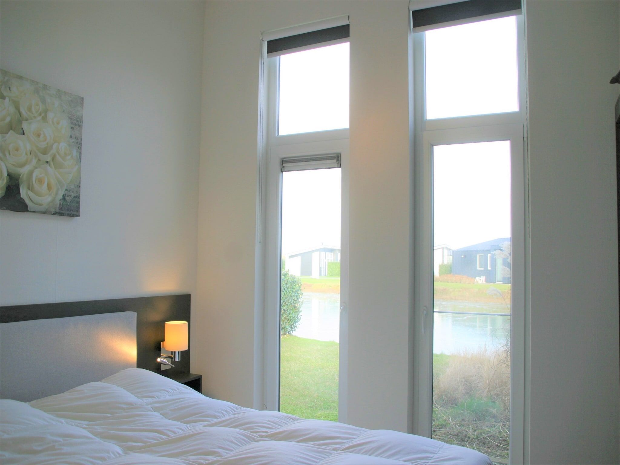 Een slaapkamer van Water Resort Oosterschelde 32 in Wemeldinge