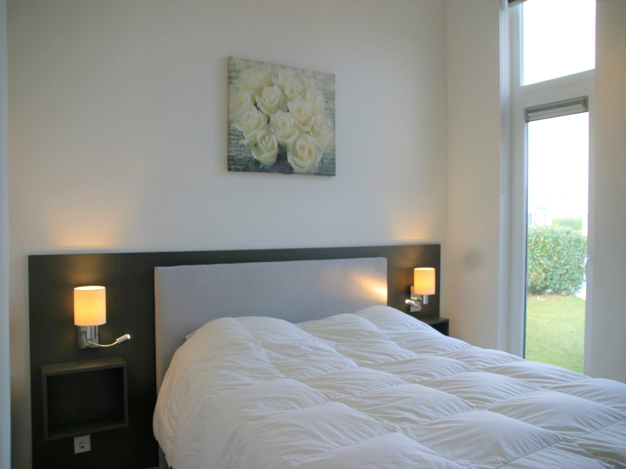 Een slaapkamer van Water Resort Oosterschelde 32 in Wemeldinge