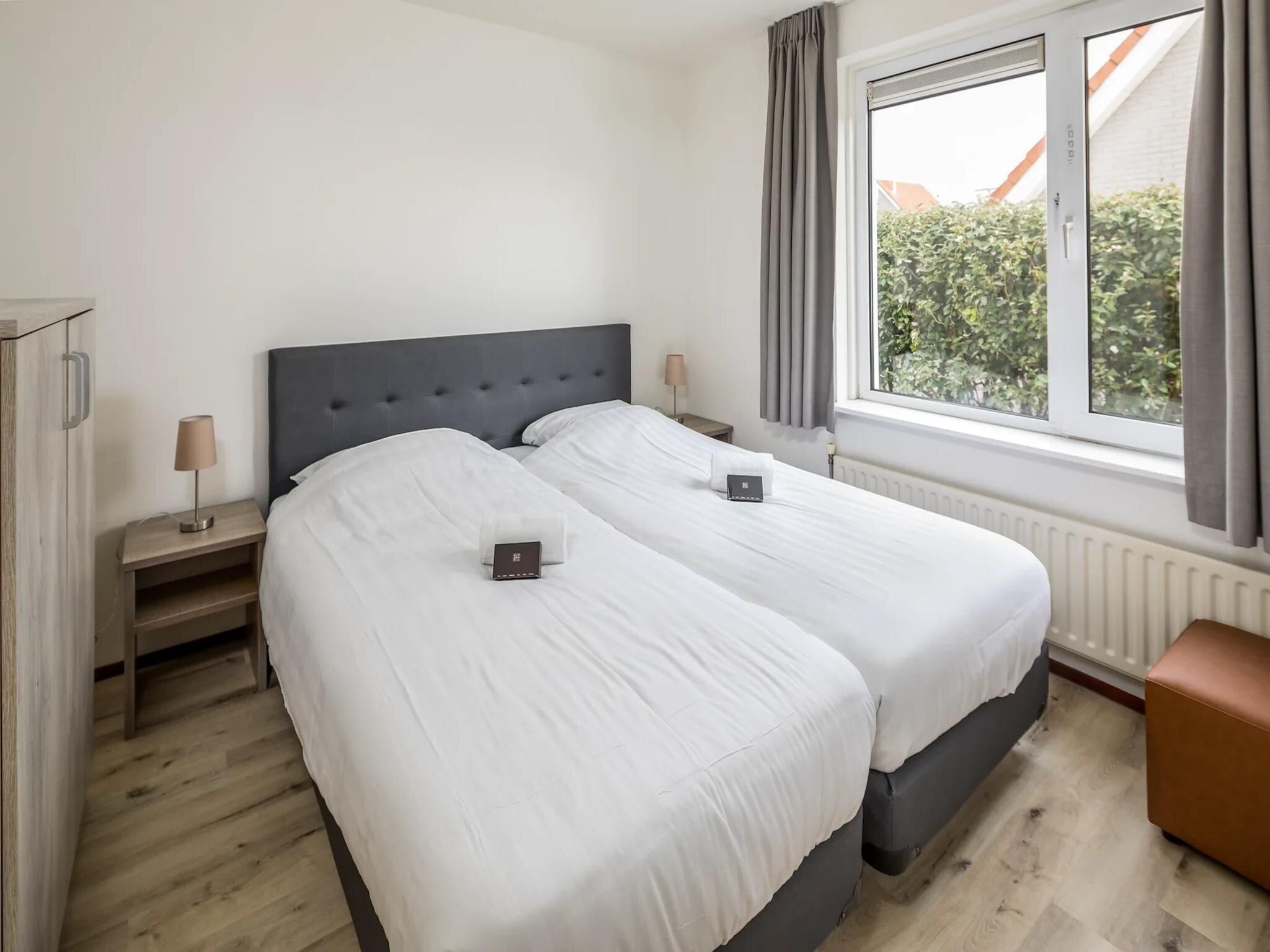 Een slaapkamer van Vakantiepark Zeeland Village 5 in Scharendijke