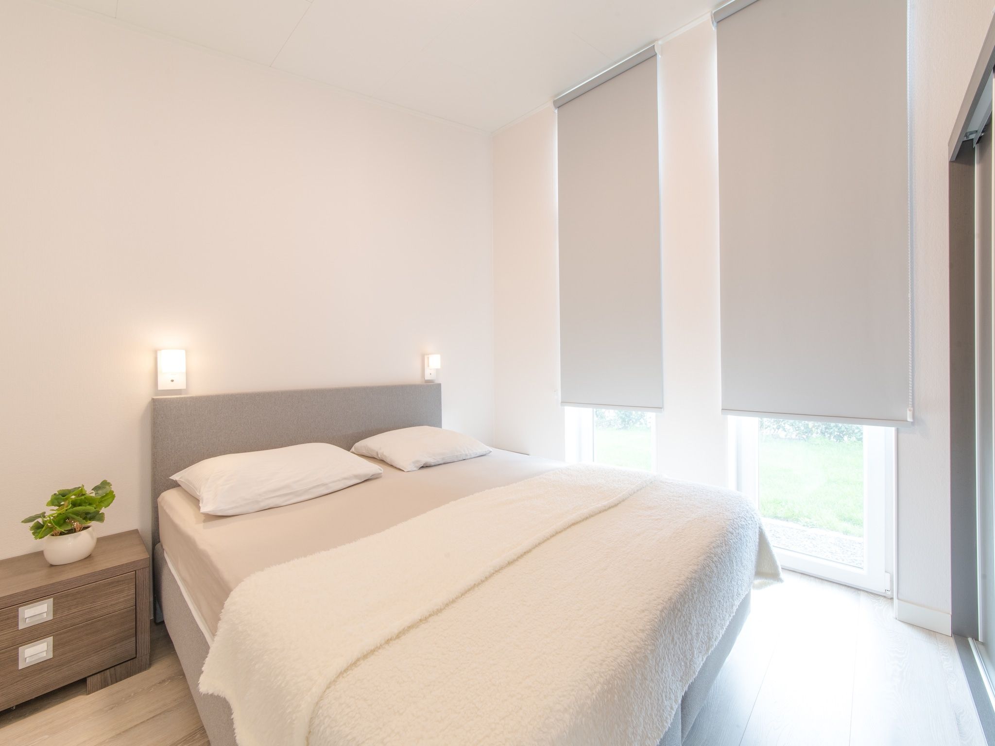 Een slaapkamer van Water Resort Oosterschelde 47A in Wemeldinge